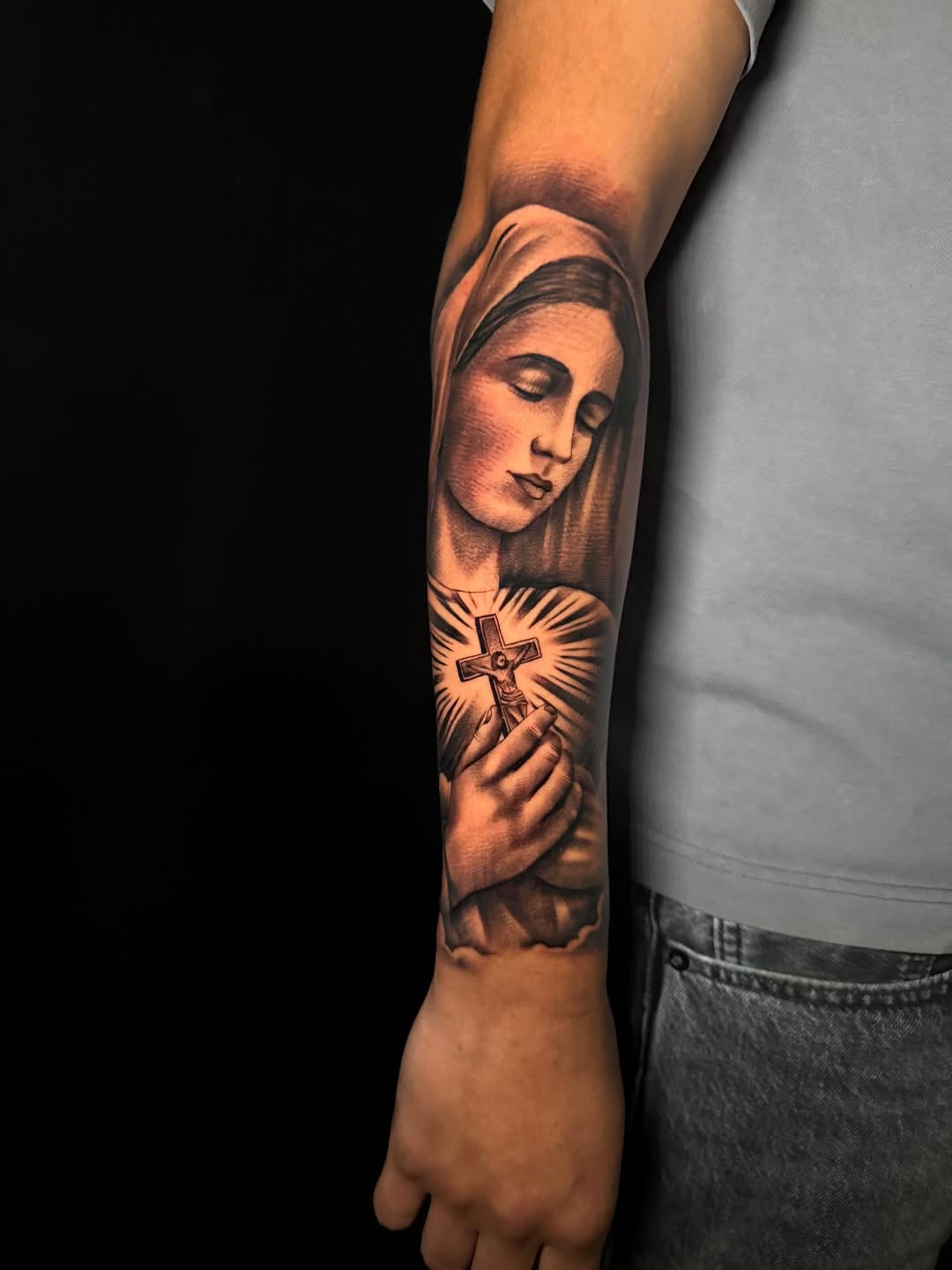 Virgin Mary with cross Chicano tattoo on the forearm by George Maldonado Austin, Austin, Texas