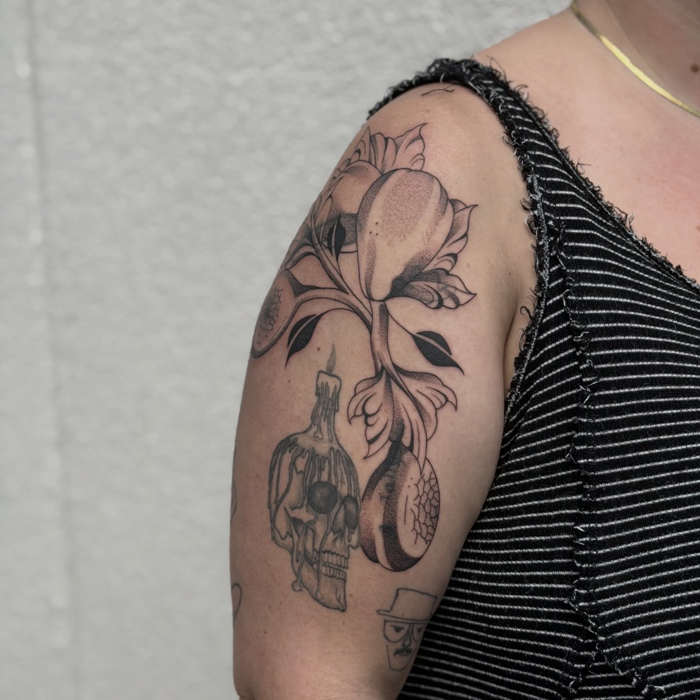 Flower and skull realism tattoo on the shoulder by Kailey Ru, Knoxville, Tennessee