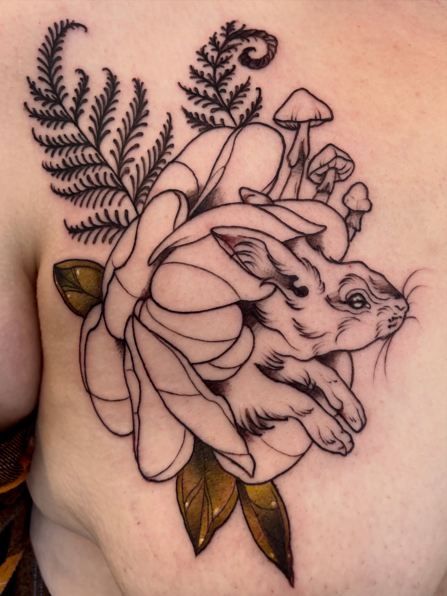 Rabbit and rose black and grey tattoo on the shoulder by Cricket Elijah Cervidae