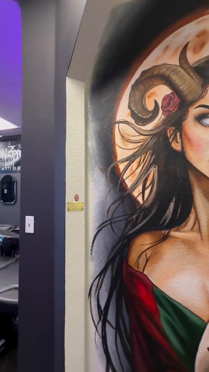 Woman with ram horns realism tattoo by Eric Garcia