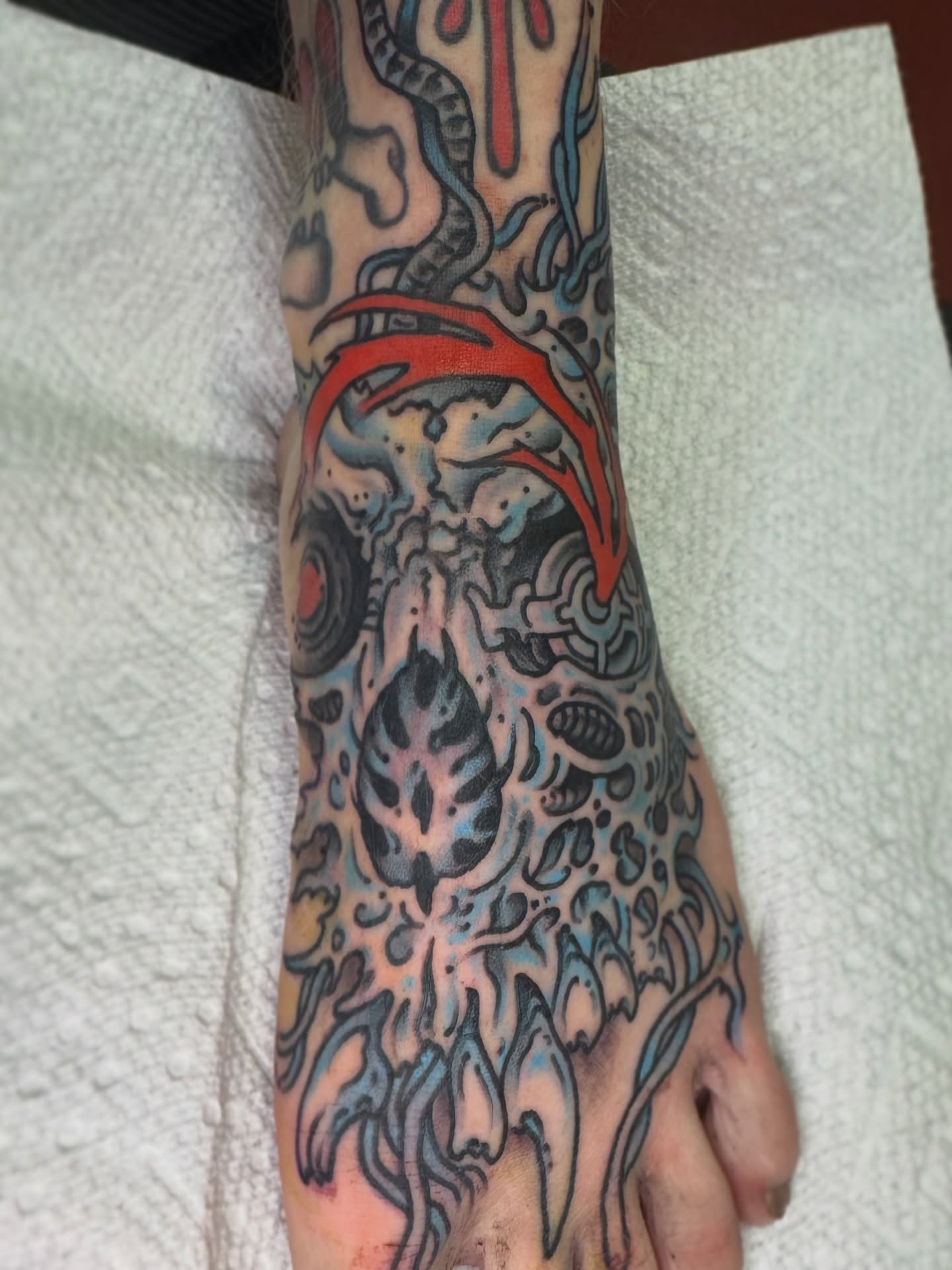 Skull dotwork tattoo on the foot by J Ranno, Richmond, Virginia