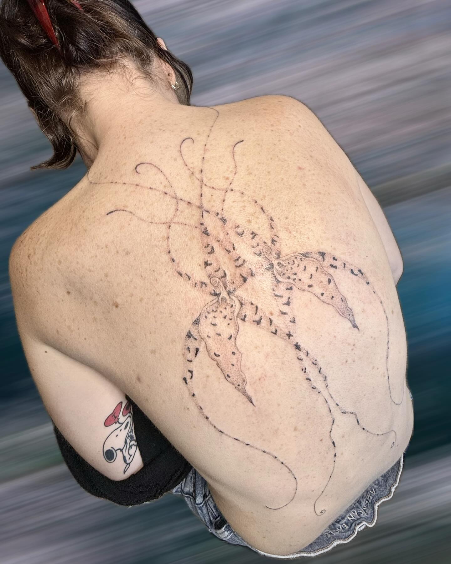 Octopus black and grey tattoo on the back by GG ๐ธ