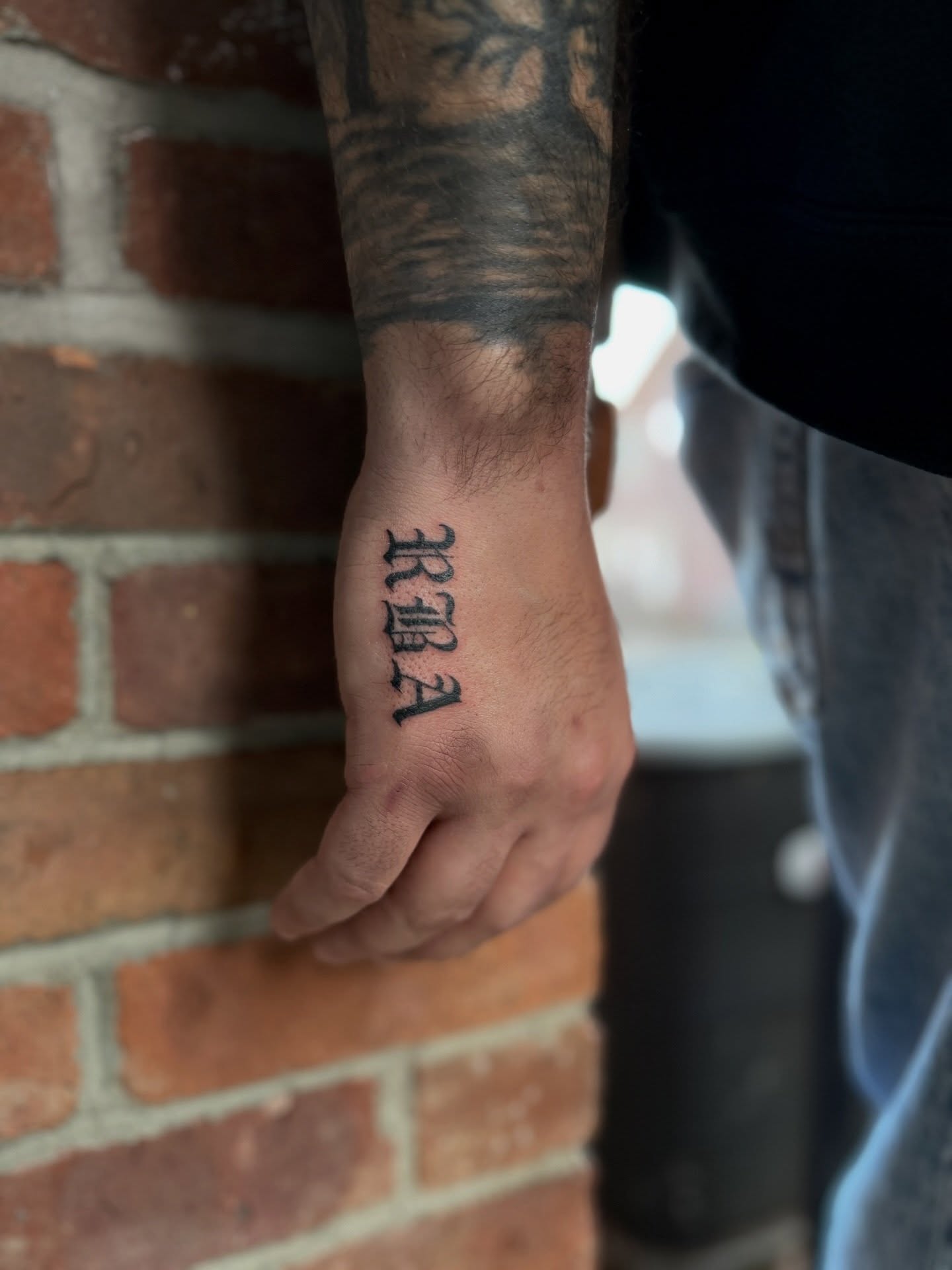 RA lettering script tattoo on the hand by Nicole Libretti ✶ Tattoo ✶ Hvny