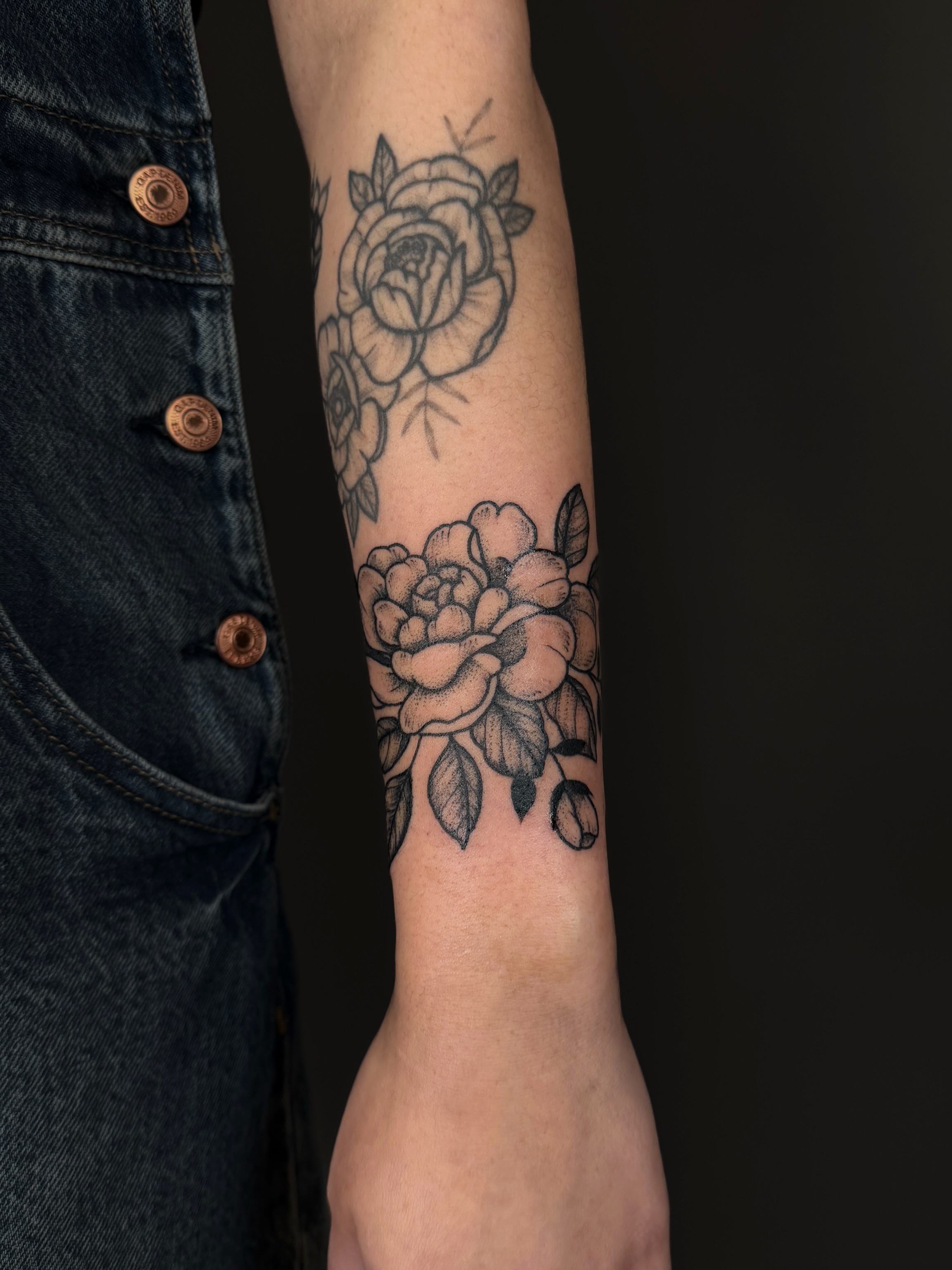 Roses black and grey tattoo on the forearm by Hannah, Portland, Oregon