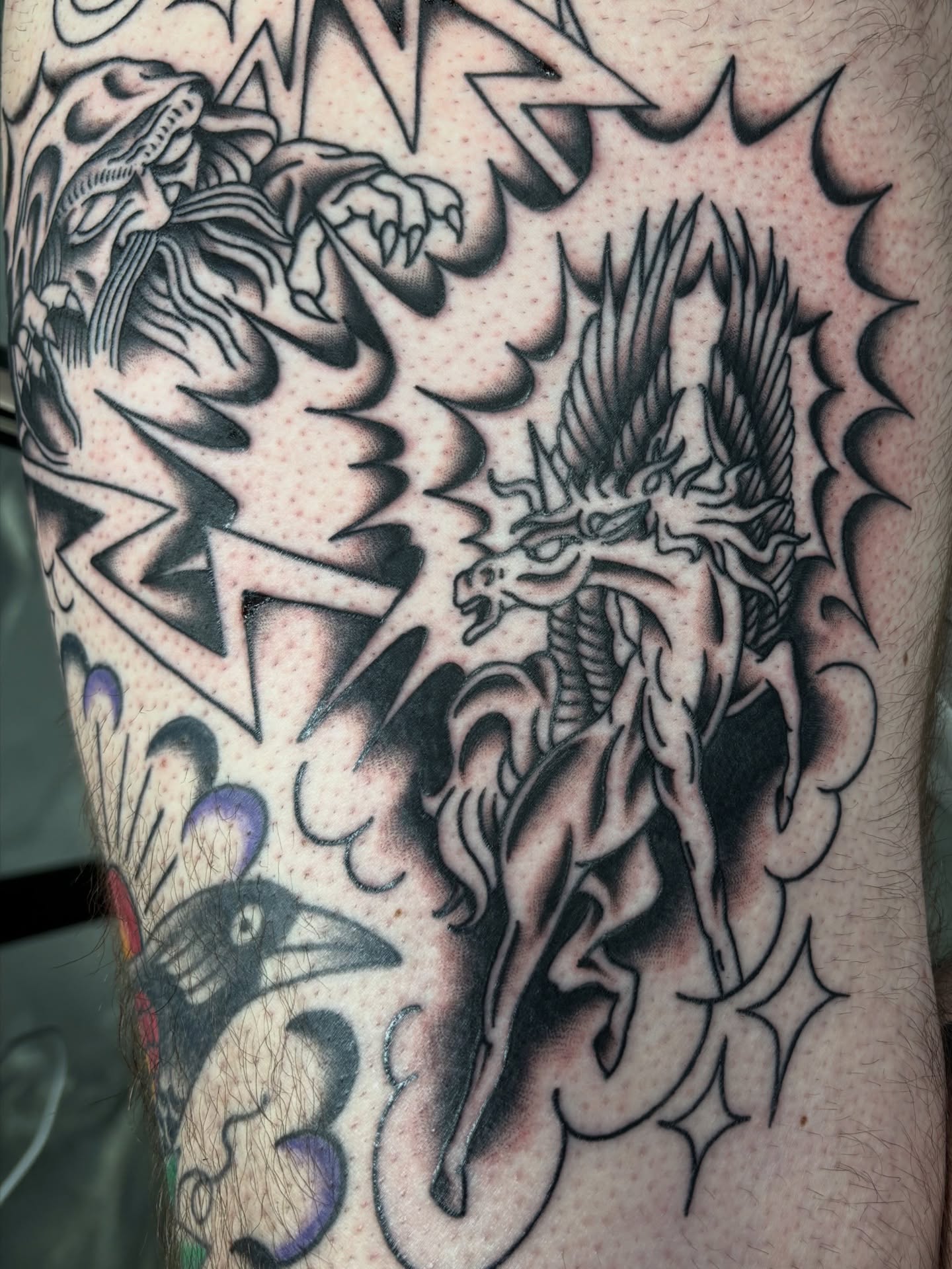 Mythical creature American traditional tattoo on the forearm by @koma_tk