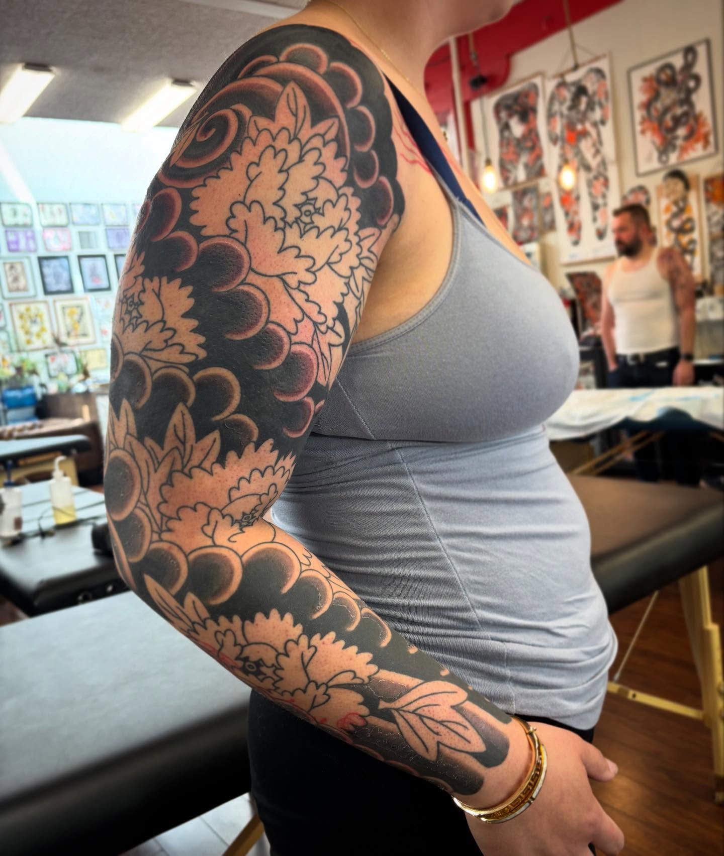 Floral sleeve japanese irezumi tattoo on the upper arm by dayton skuse, Portland, Oregon