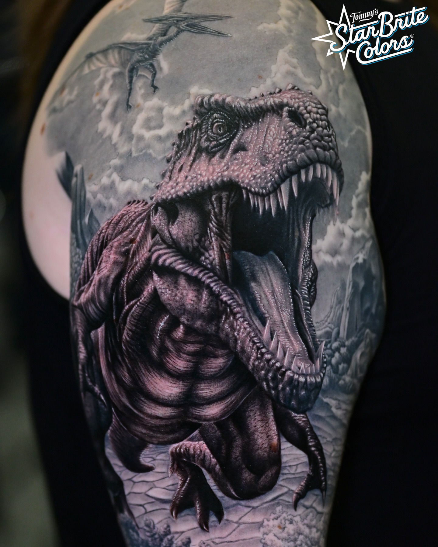 Tyrannosaurus rex realism tattoo on the upper arm by Sean OHara