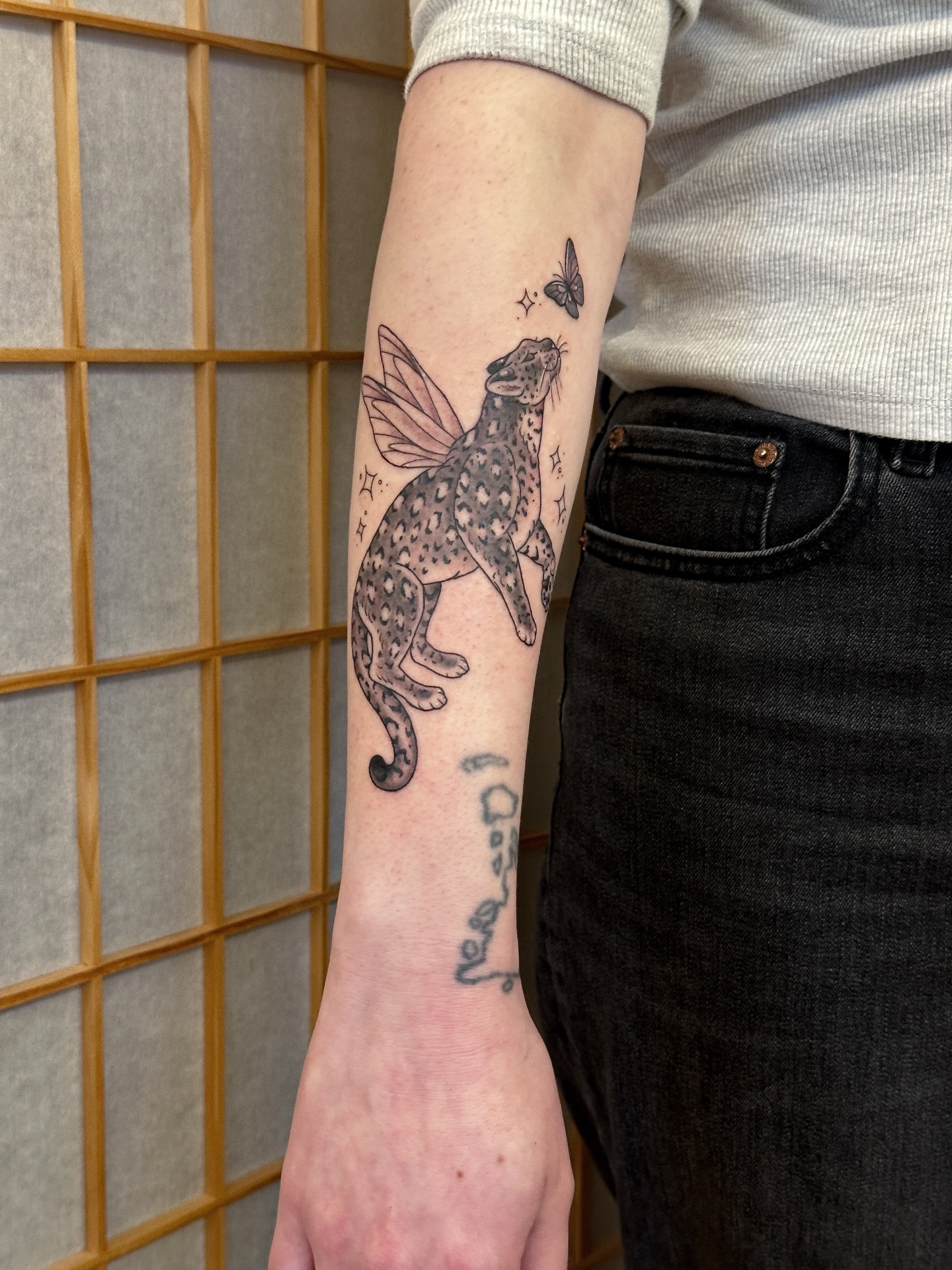 Cheetah fairy dotwork tattoo on the forearm by Tattooing by Patty Valentine
