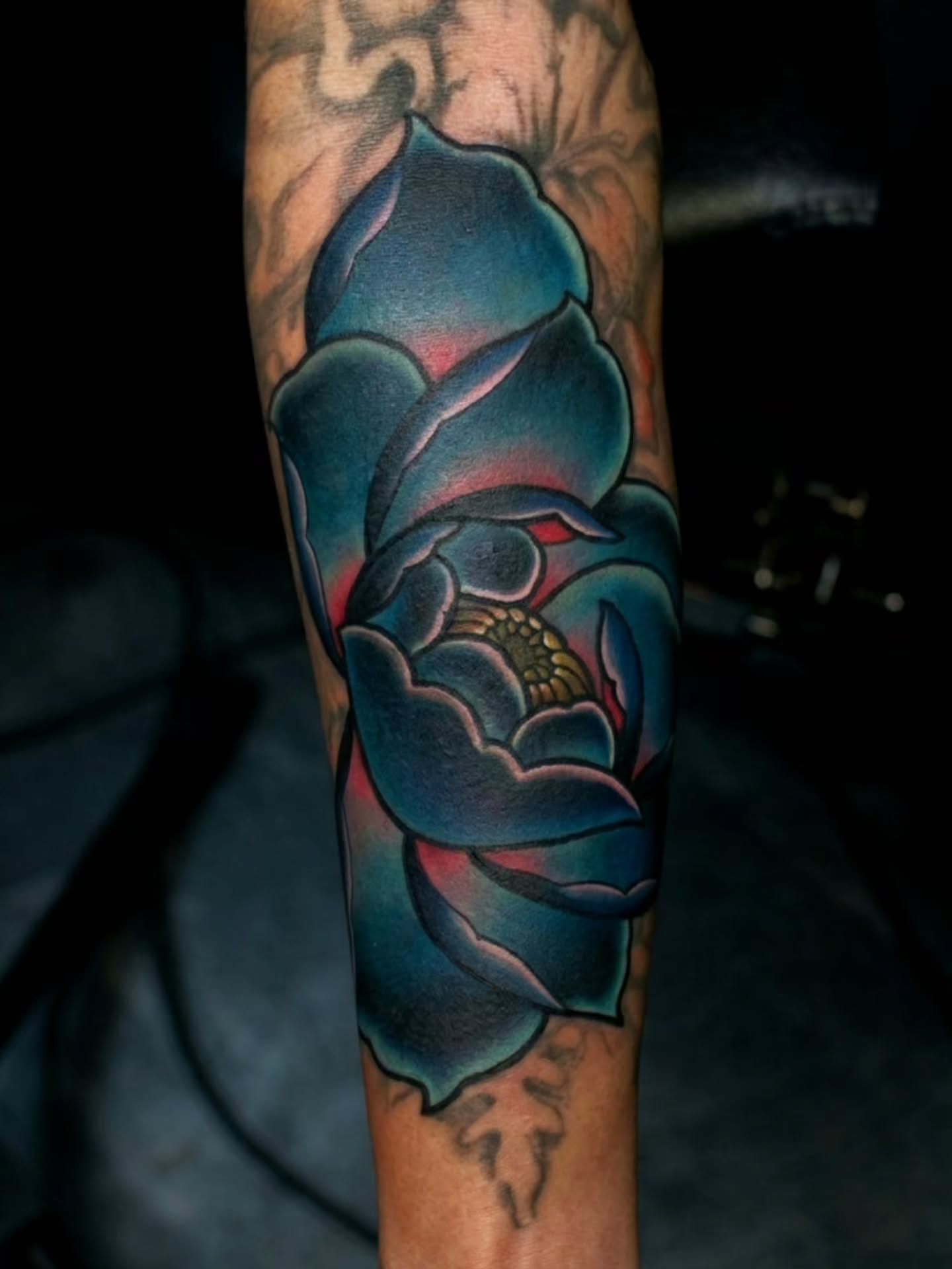 Blue rose American traditional tattoo on the forearm by Joey Vinci, Phoenix, Arizona