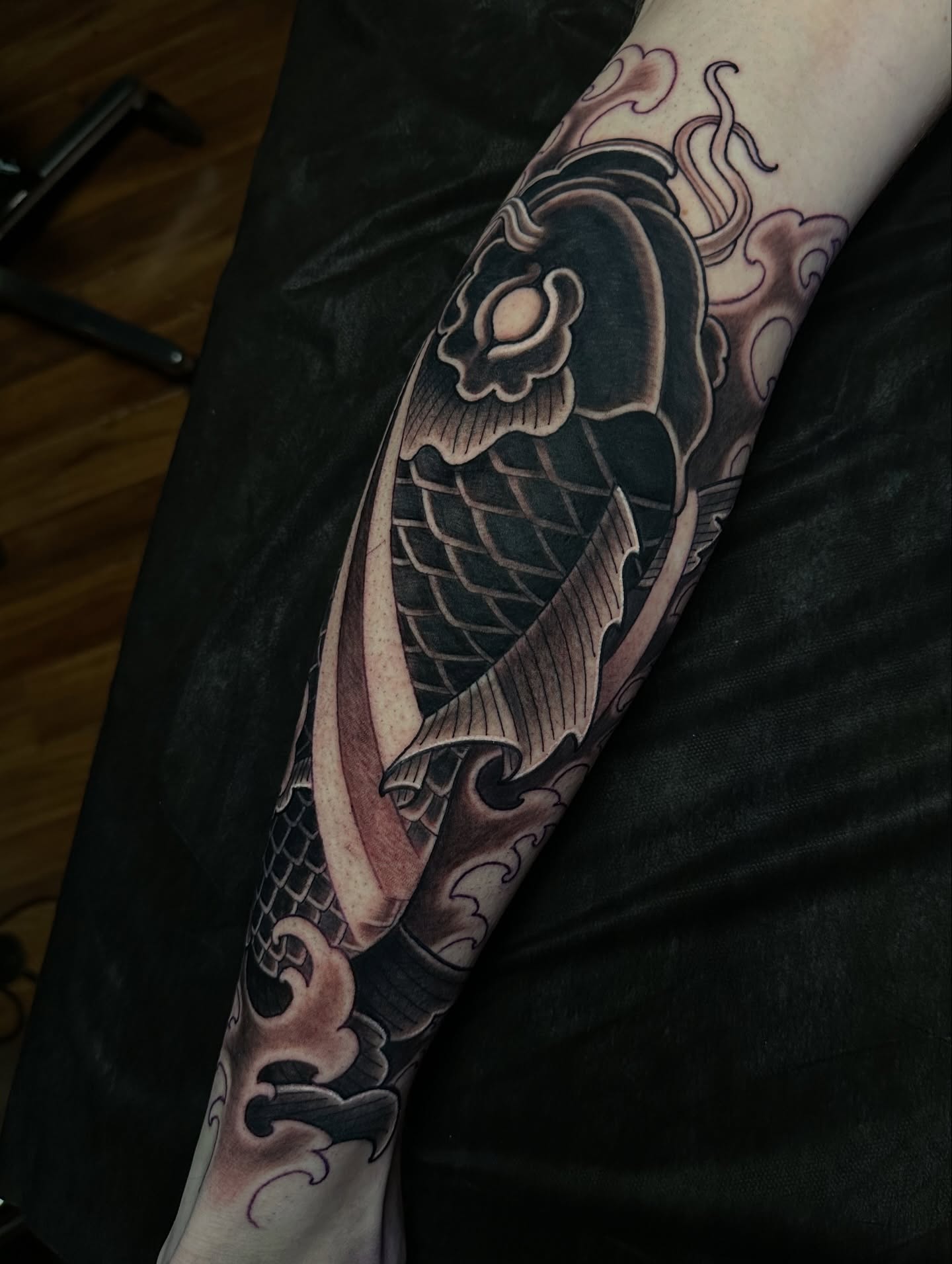 Koi fish japanese irezumi tattoo on the forearm by Trevor Burtz
