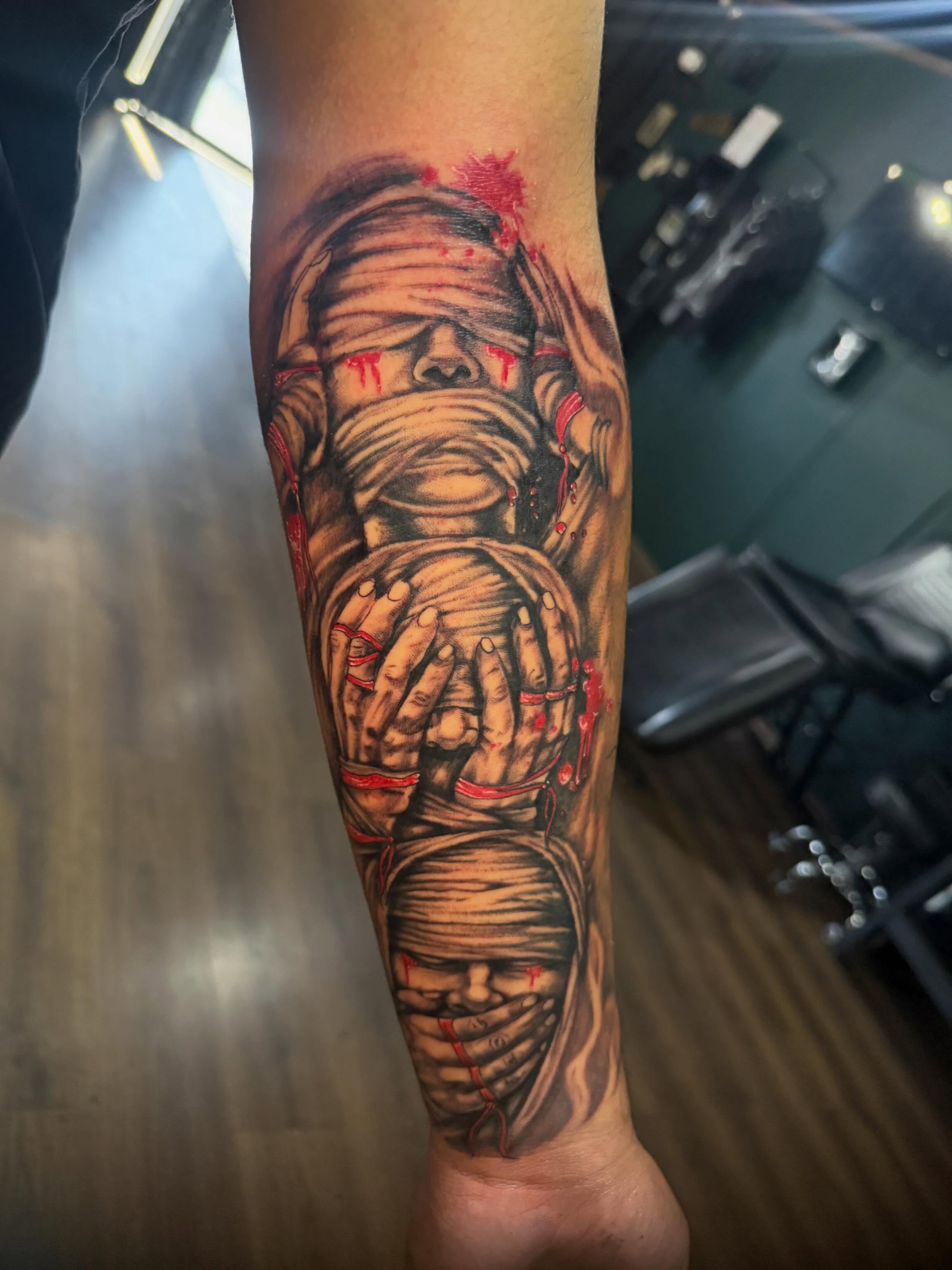 Mummy realism tattoo on the forearm by Teara faith krigbaum