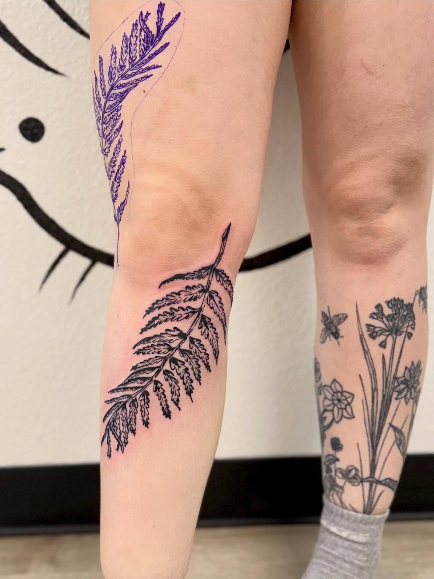 Fern leaf black and grey tattoo on the calf by Peggy