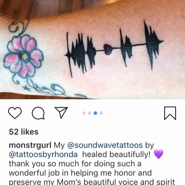 Soundwave tattoo with a flower watercolor tattoo on the forearm by Rhonda Faber Green