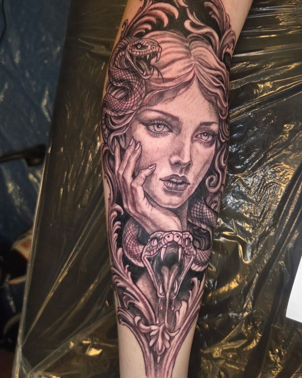 Medusa realism tattoo on the forearm by Danny Stewart
