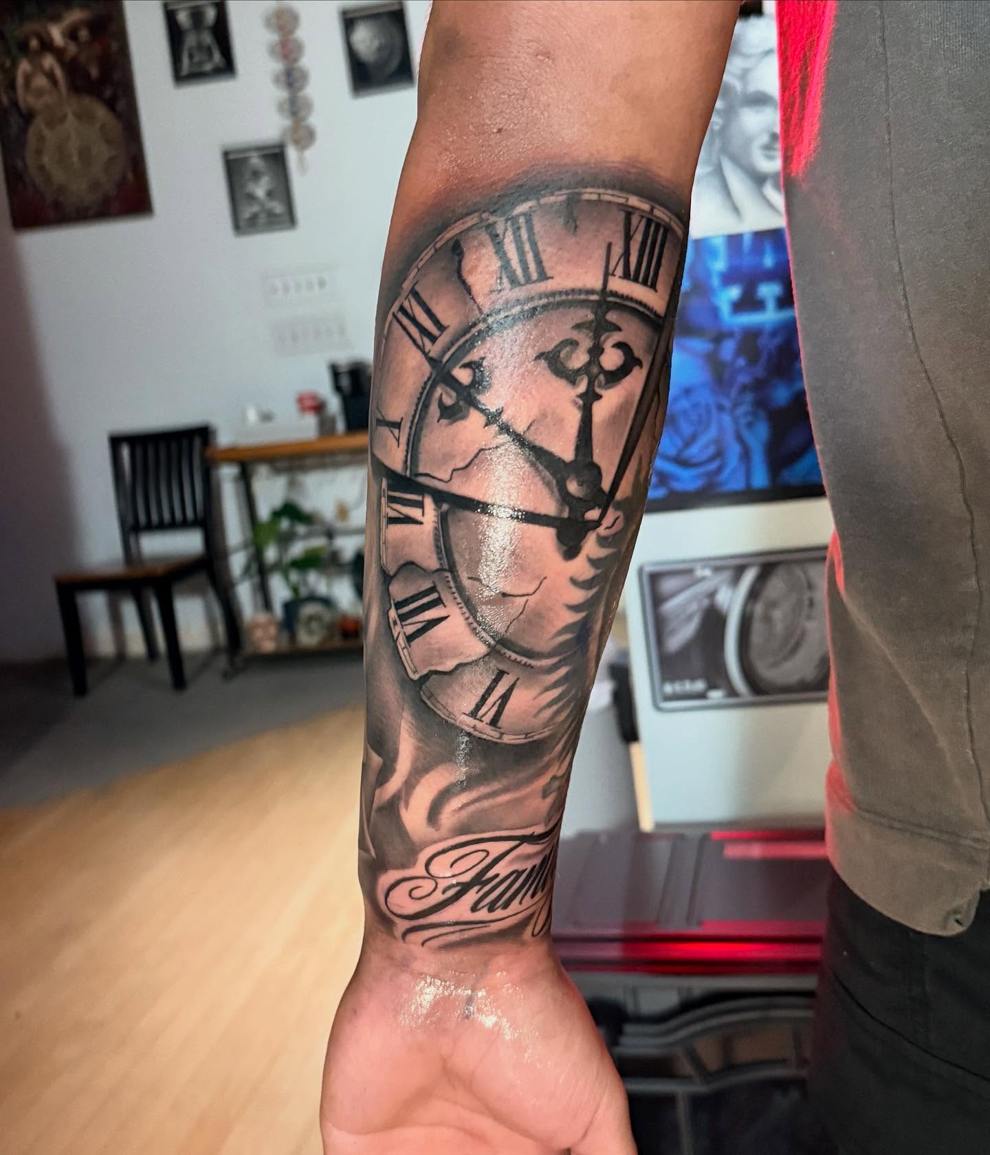 Clock black and grey tattoo on the forearm by LOS