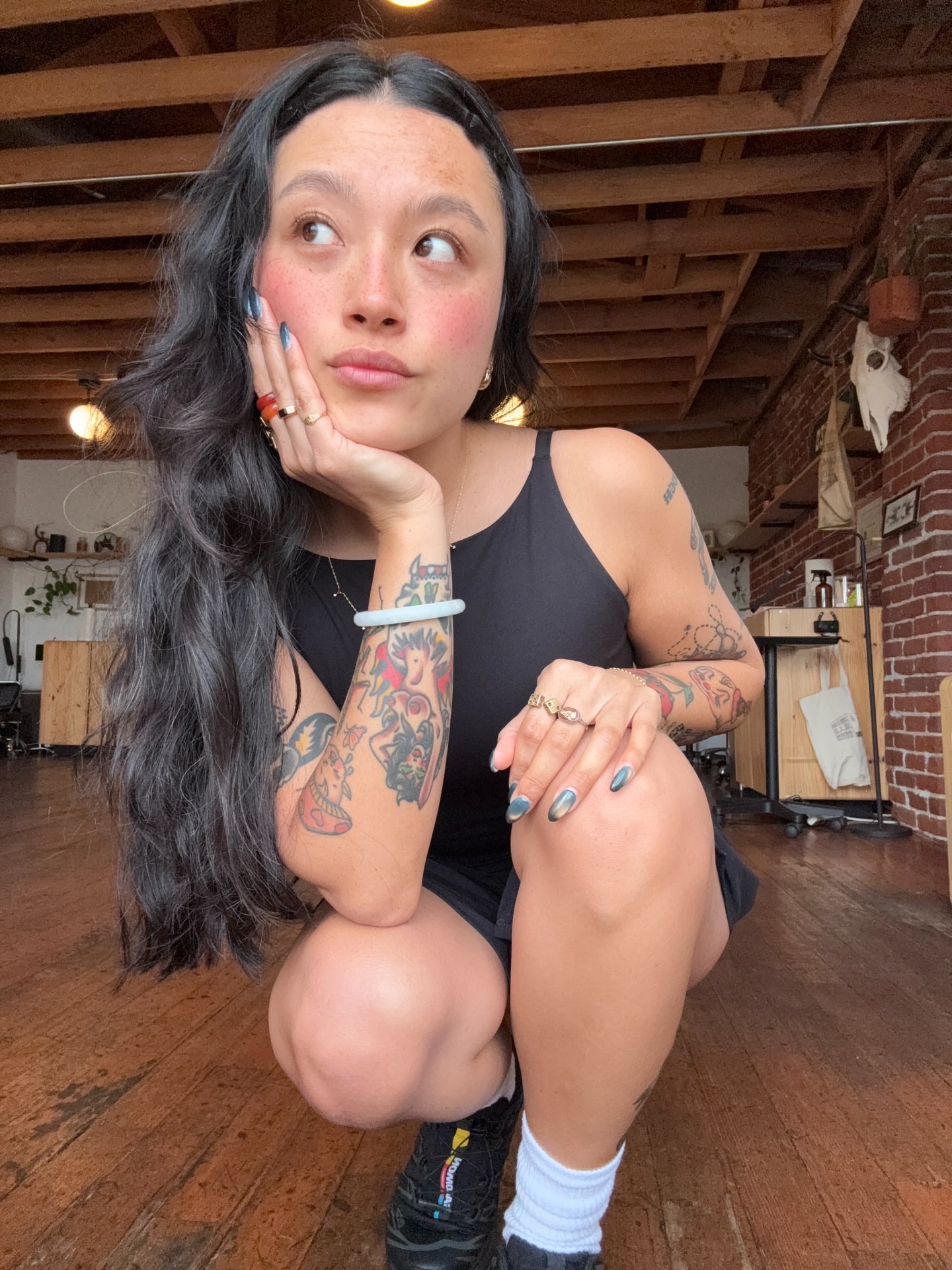 Tattooed arm American traditional tattoo on the upper arm by Aysia Mankin-Wong, San Francisco, California