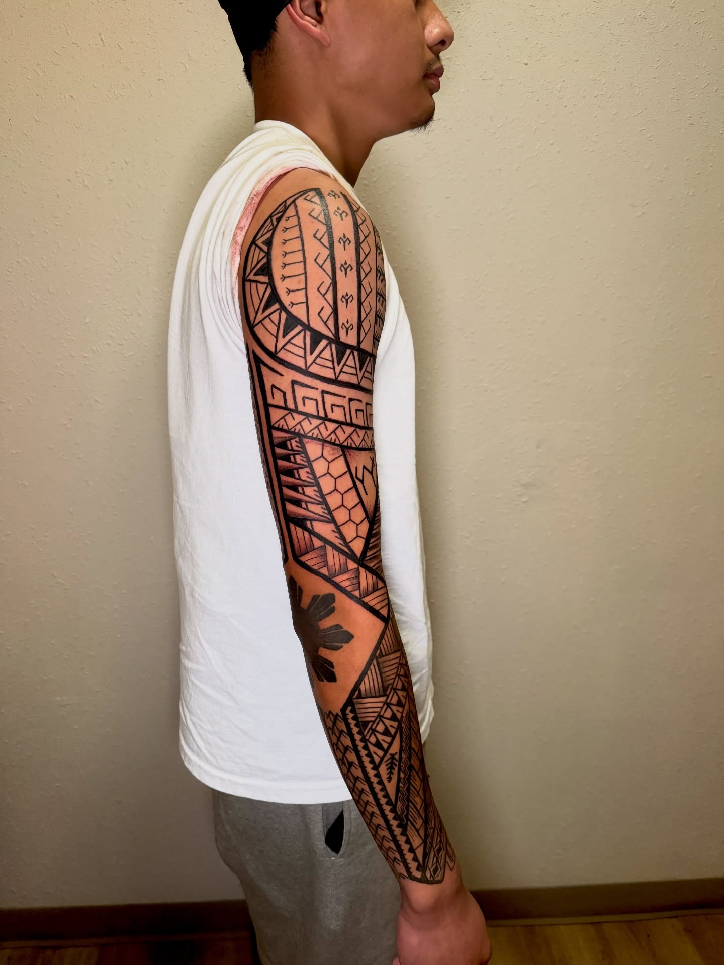 Tribal pattern tribal tattoo on the forearm by Caloy Obra