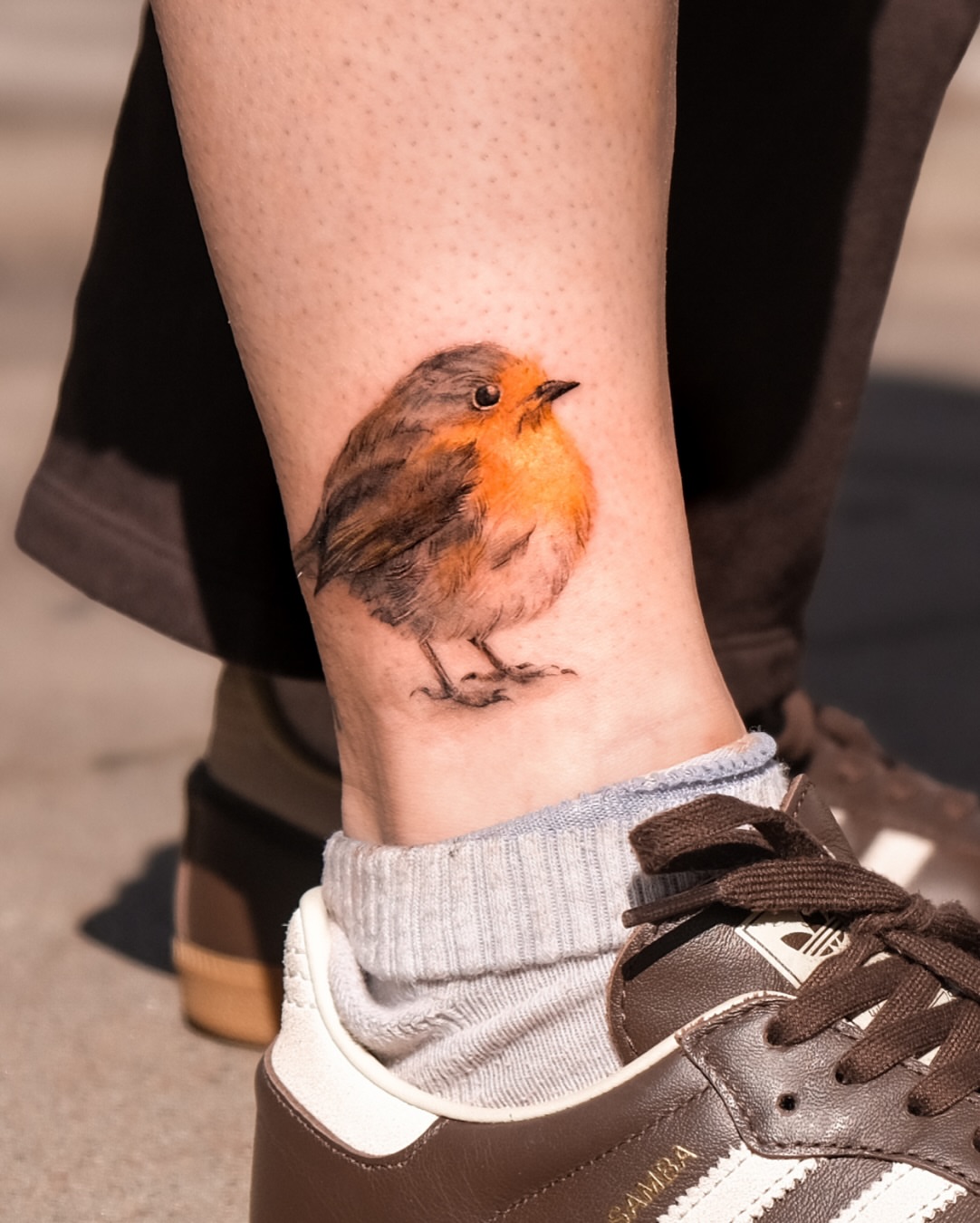 Bird realism tattoo on the calf by @michaelryan_tattoo