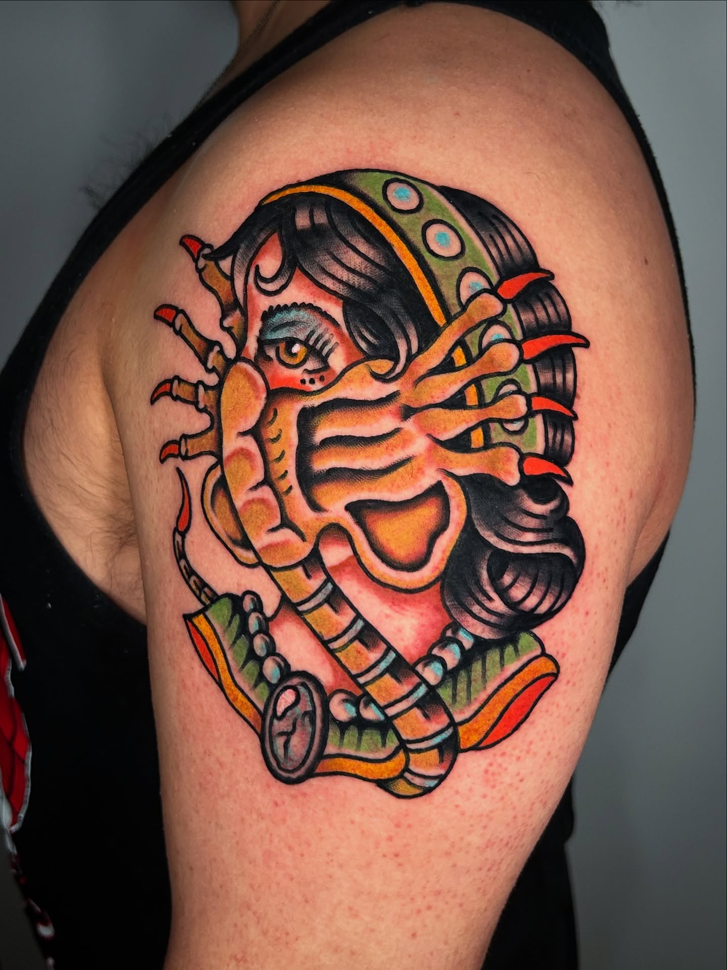 Woman with snake American traditional tattoo on the shoulder by Kit Miller, Indianapolis, Indiana