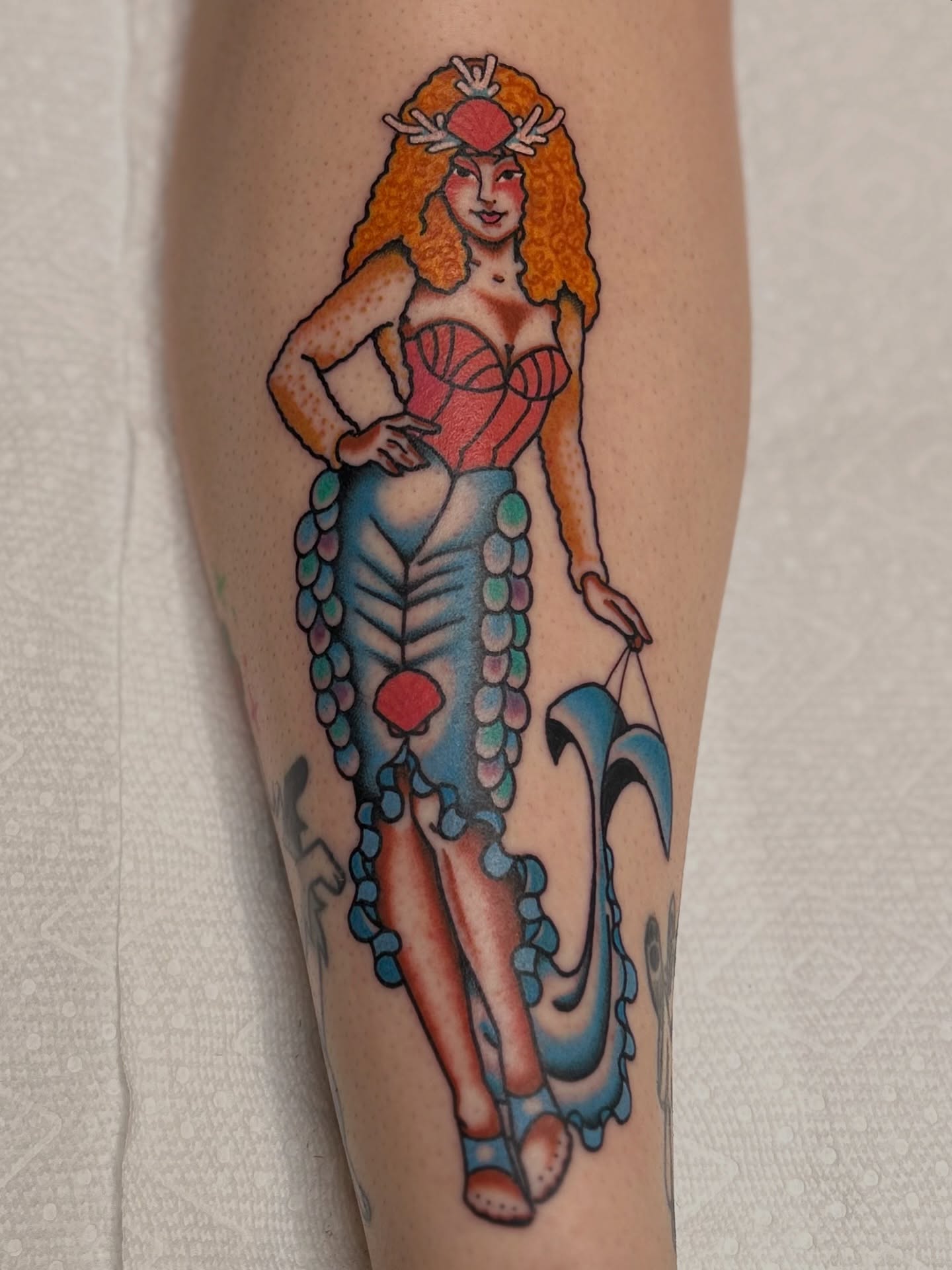 Mermaid American traditional tattoo on the calf by Lauren Alexandra
