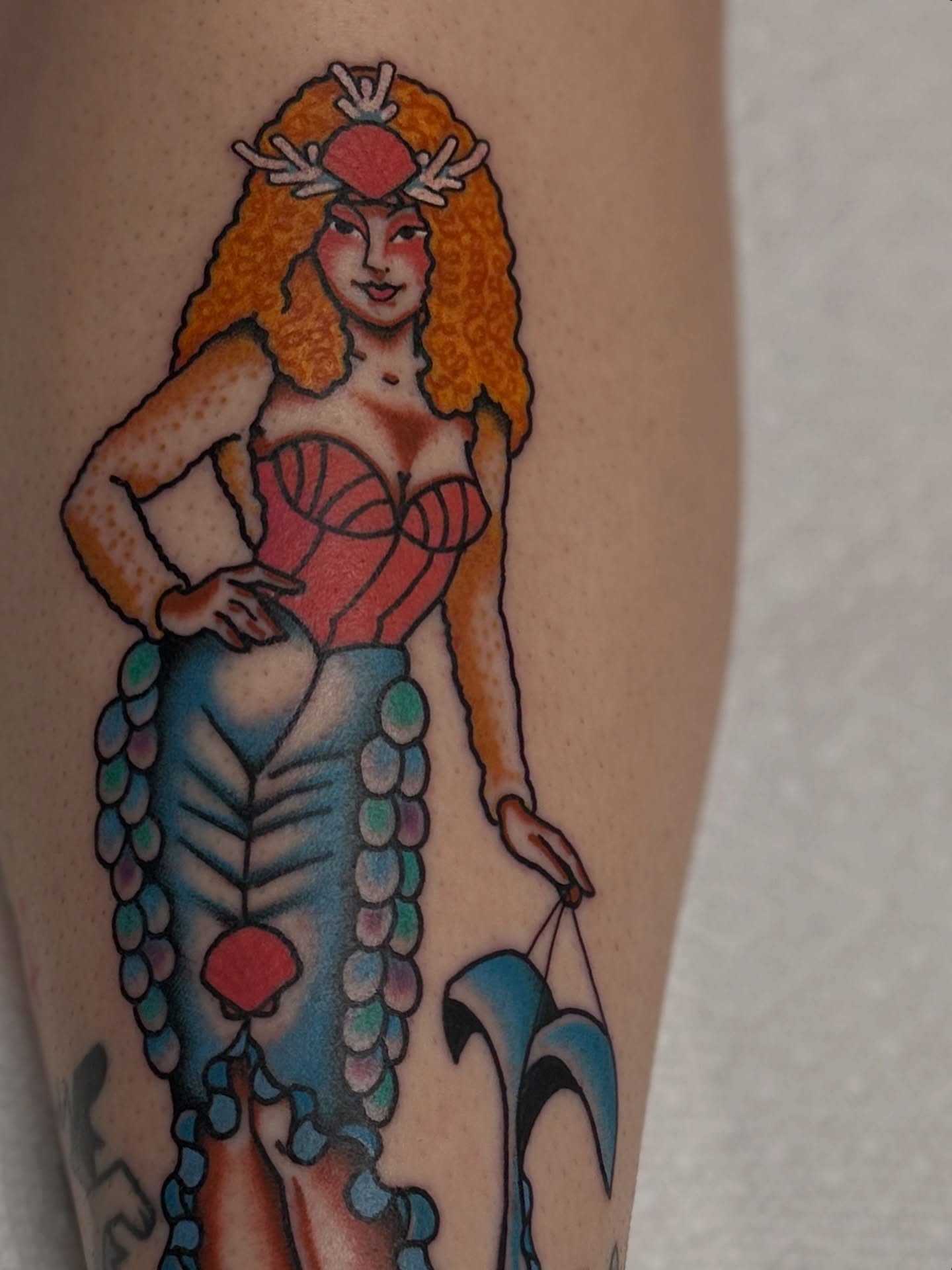 Mermaid American traditional tattoo on the forearm by Lauren Alexandra