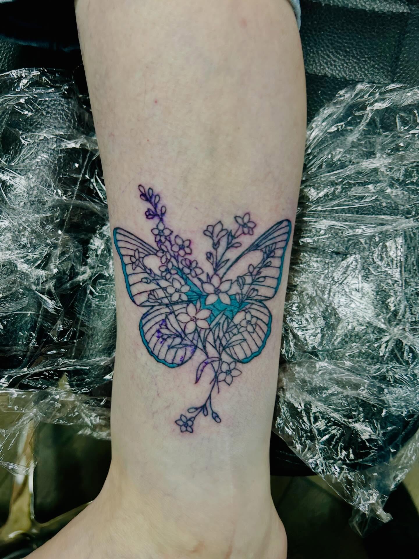 Butterfly fine line tattoo on the forearm by Bjorn Bjornstad, Dubuque, Iowa