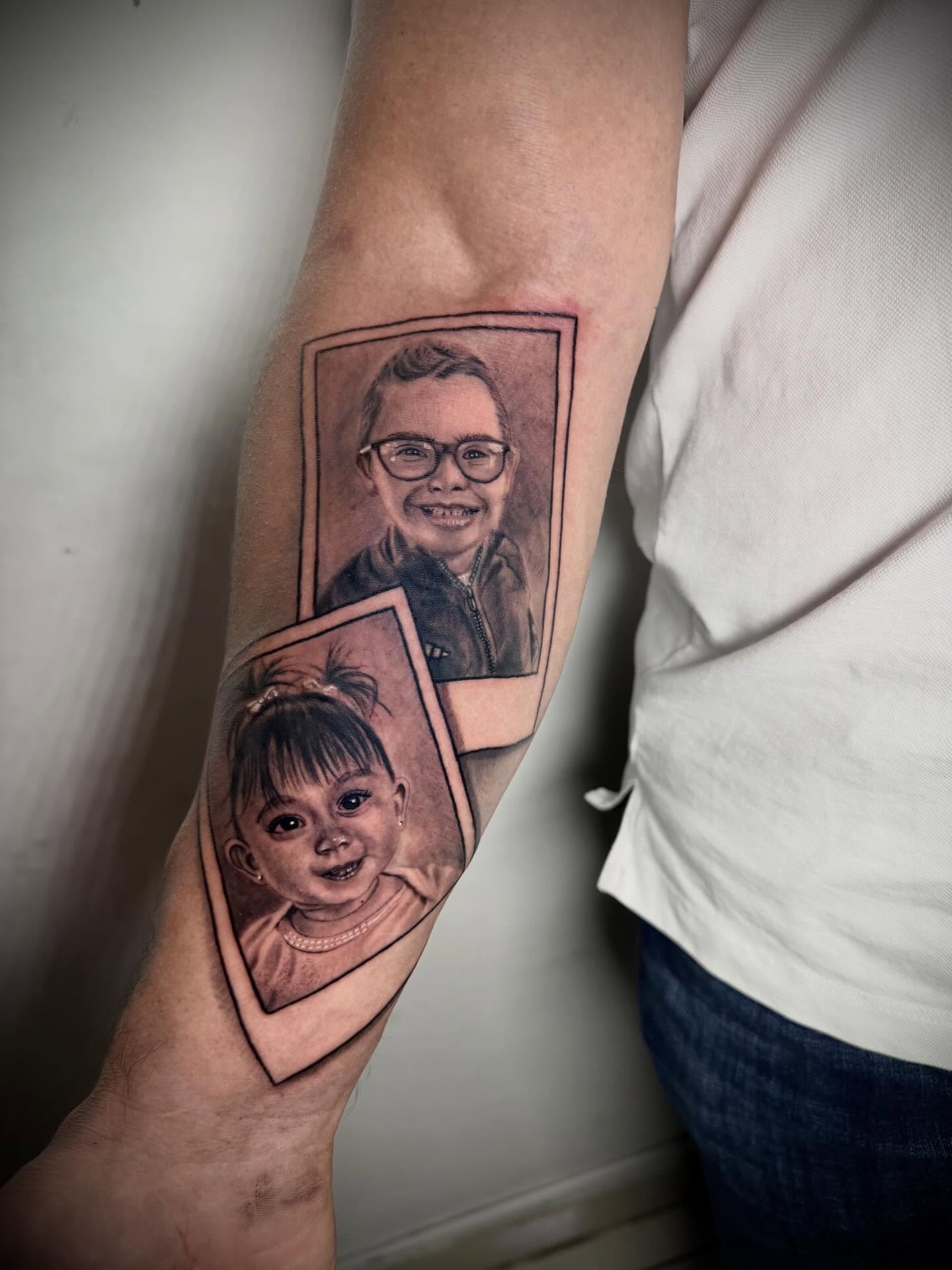Child portraits realism tattoo on the forearm by Daniel Ruiz