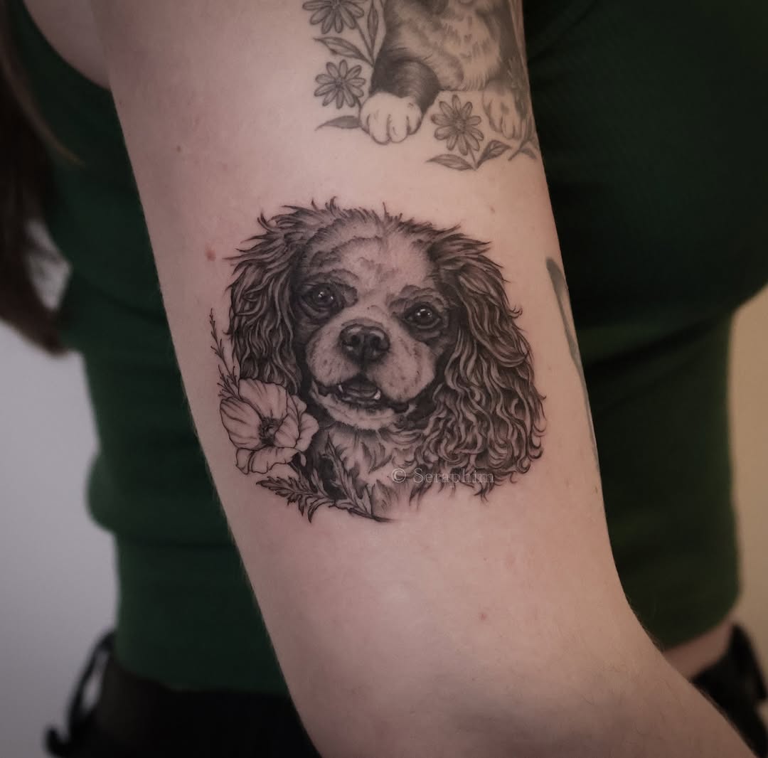 Tattoo by @seraphim.fineline — realism, black_and_grey