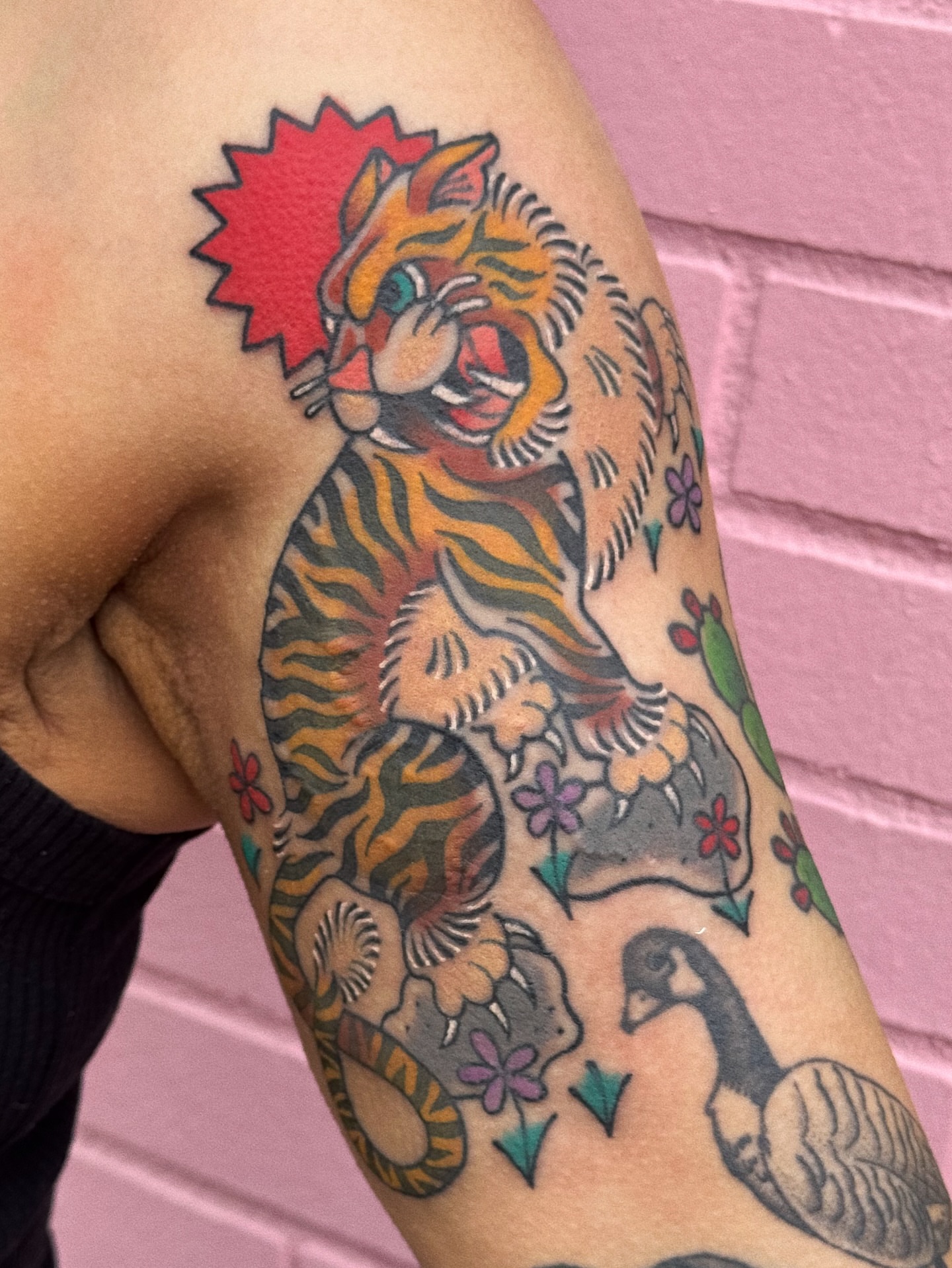 Tiger and goose American traditional tattoo on the forearm by 𝕷𝖆𝖚𝖗 𝕷𝖆𝖚𝖗