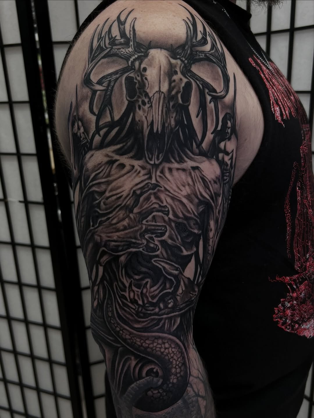 Tattoo by @nickbridwelltattoo — dark_realism, black_and_grey