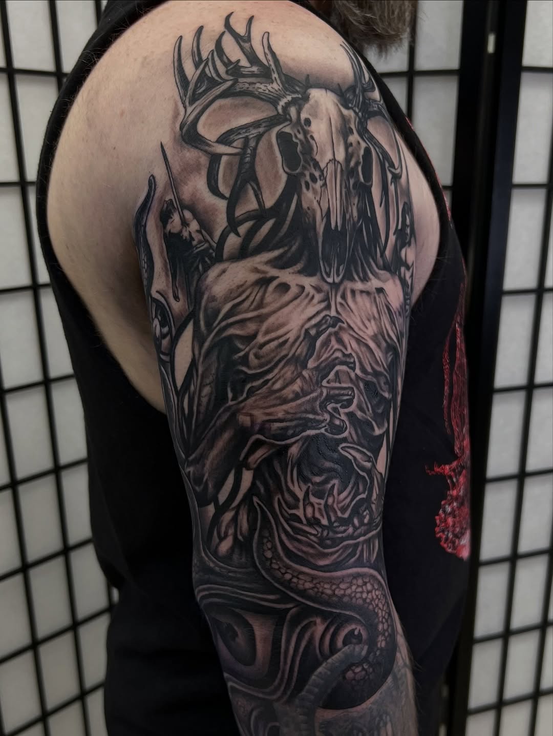 Tattoo by @nickbridwelltattoo — dark_realism, black_and_grey