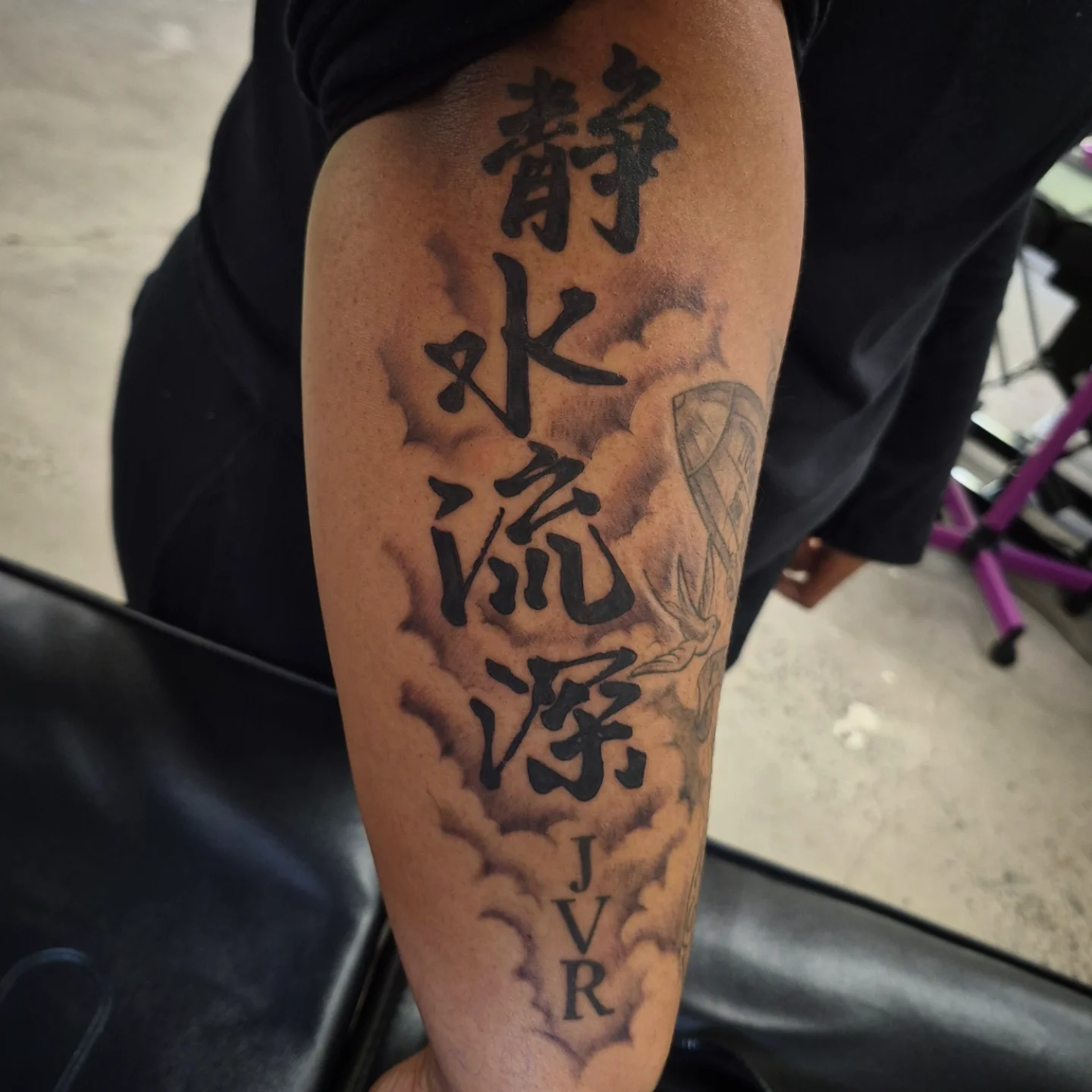Chinese characters and anchor black and grey tattoo on the forearm by Lydia Kiley