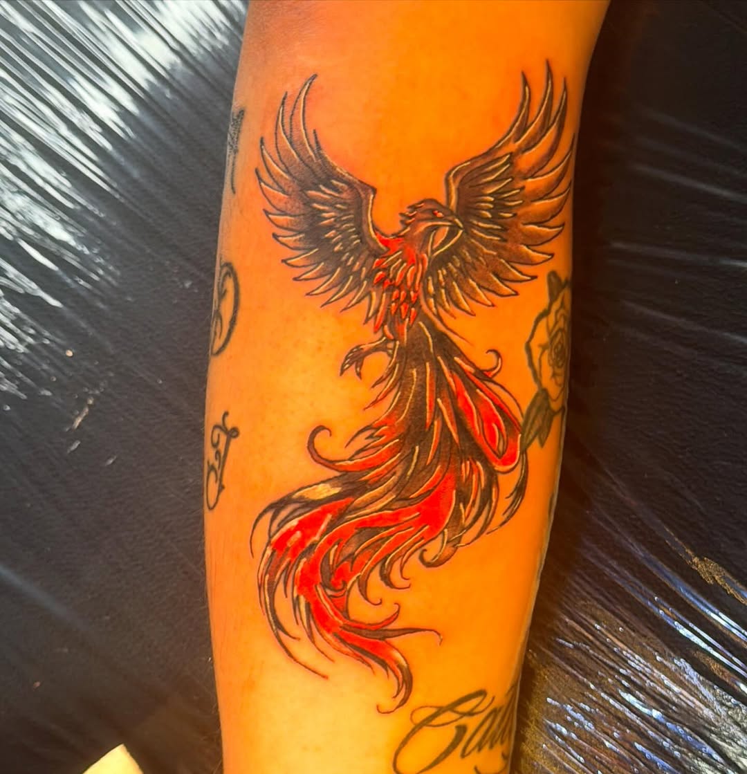 Phoenix realism tattoo on the forearm by MY$T