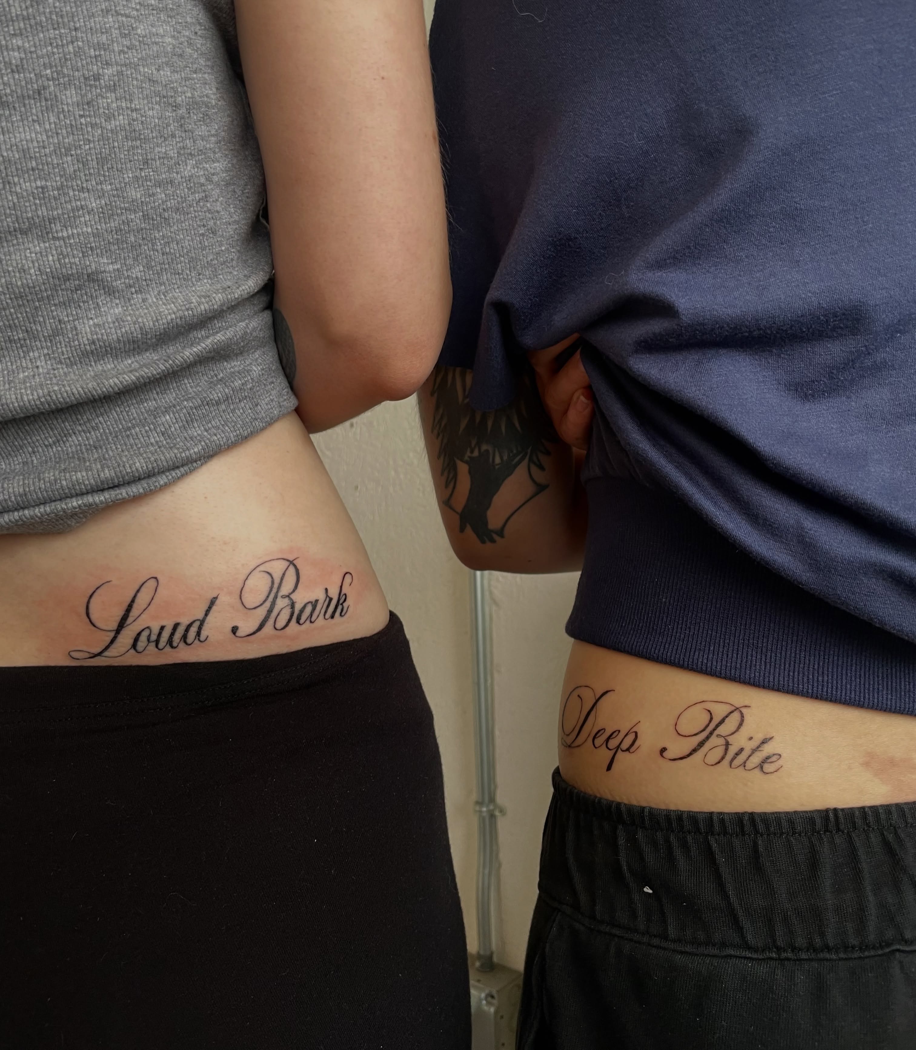 Dog black and grey tattoo on the ribs by bisabuelita