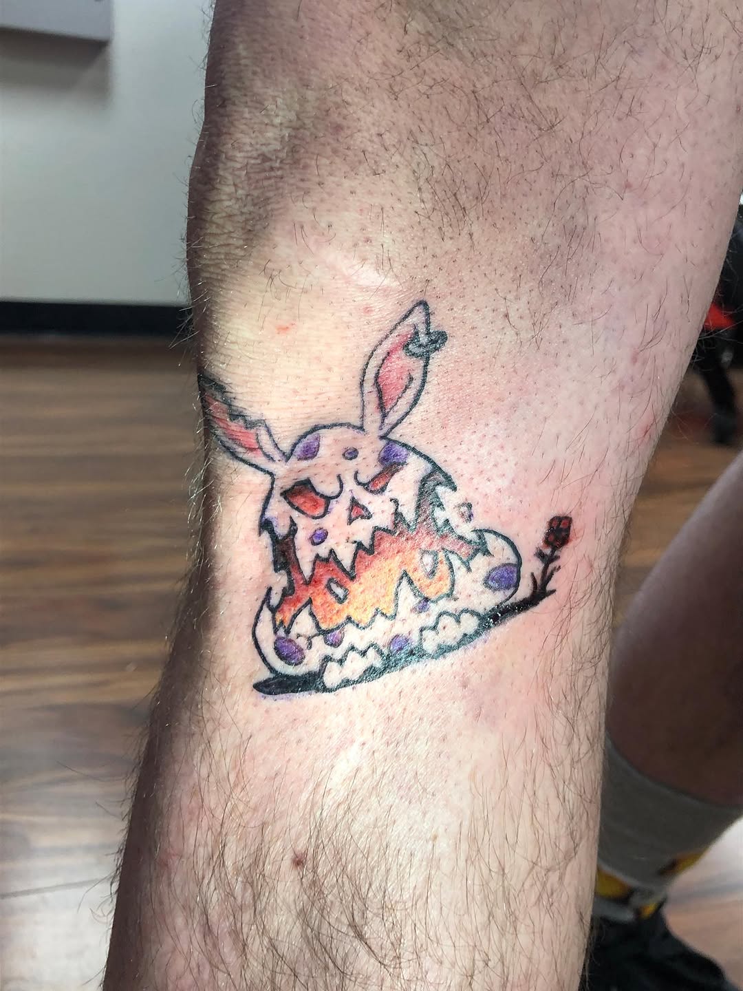 Creepy bunny with rose American traditional tattoo on the forearm by Dharm, Denver, Colorado