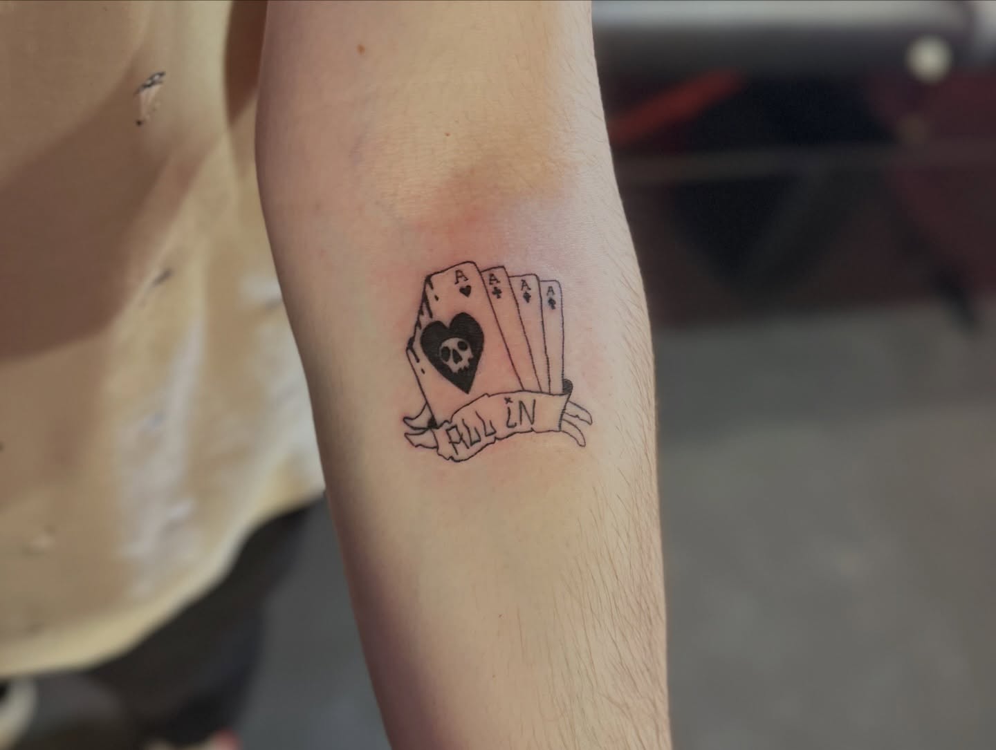 Playing cards and heart black and grey tattoo on the forearm by Lunette : a little moon as simple as that