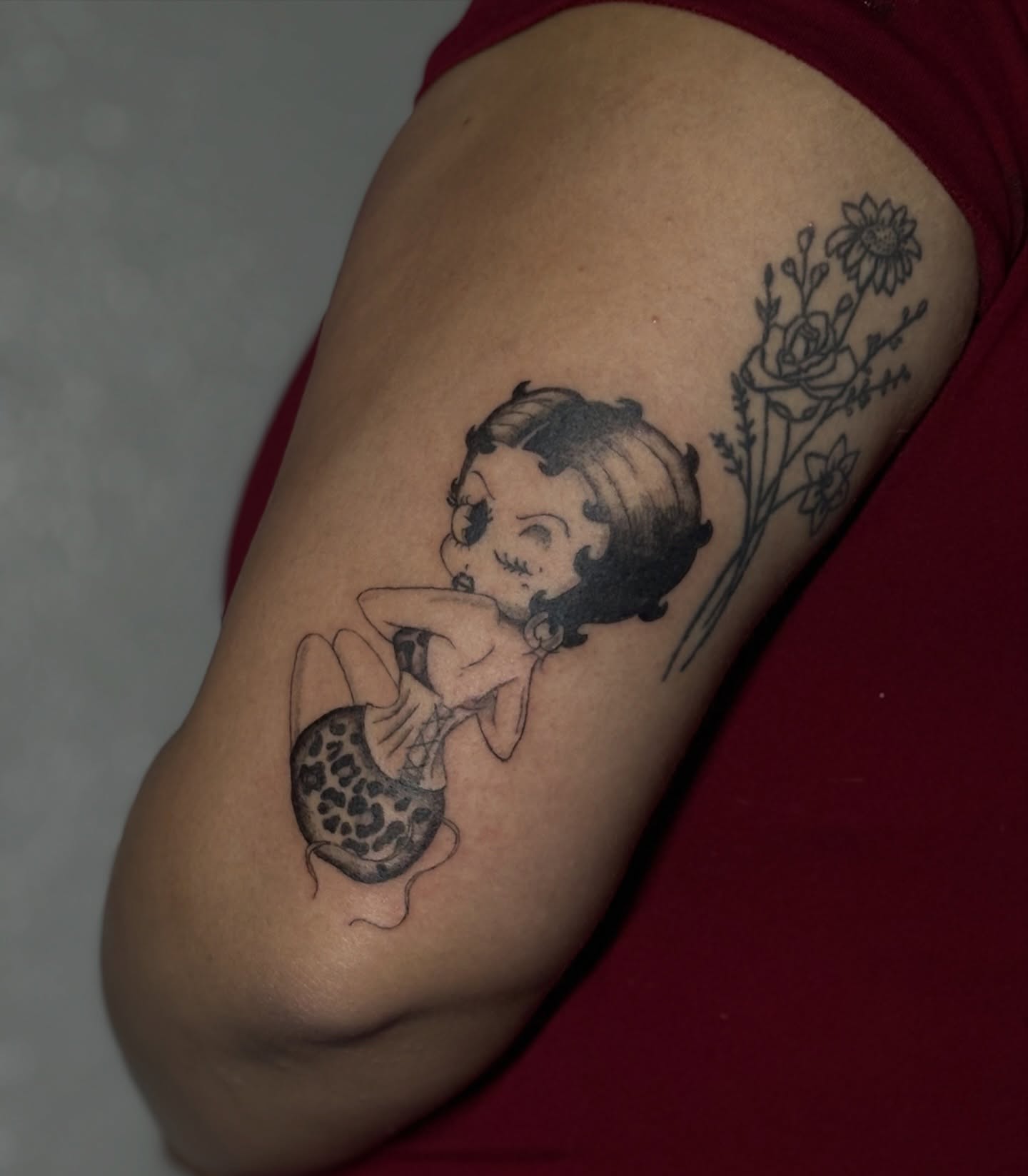 Betty Boop mermaid black and grey tattoo on the thigh by Valentina