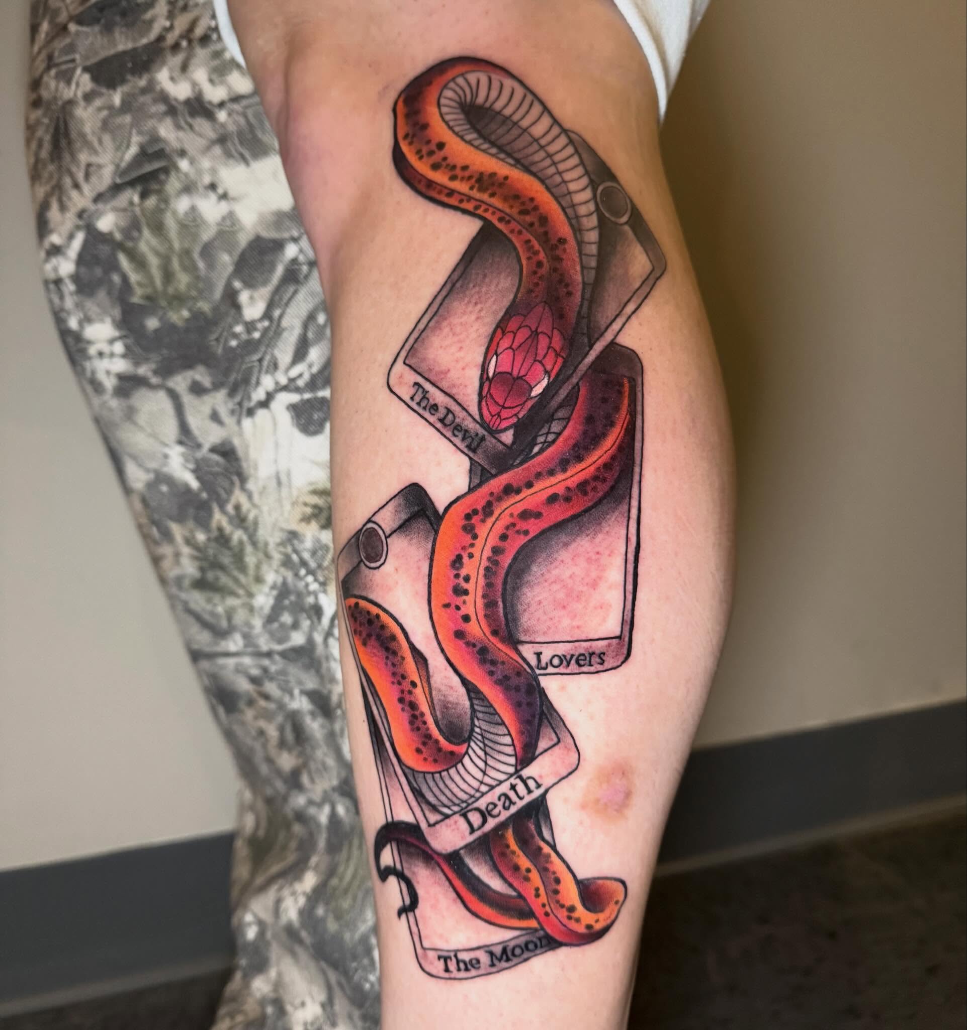 Tarot cards and snake American traditional tattoo on the forearm by Mike Bean, Minneapolis, Minnesota