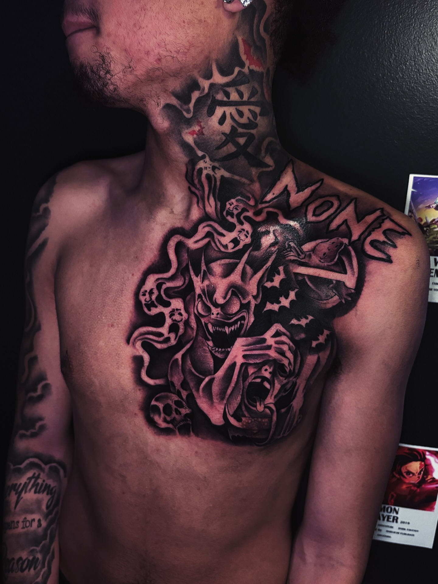 Demon with roses dark realism tattoo on the chest by Bri Tatted That