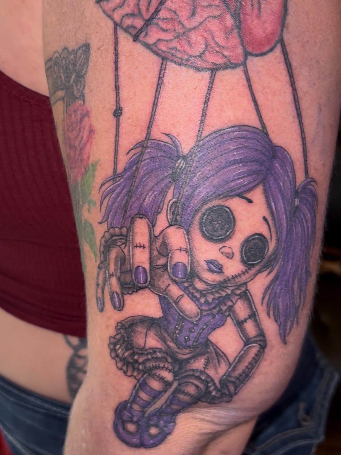Doll dark realism tattoo on the forearm by 𝔾𝔥𝓸ş𝔱