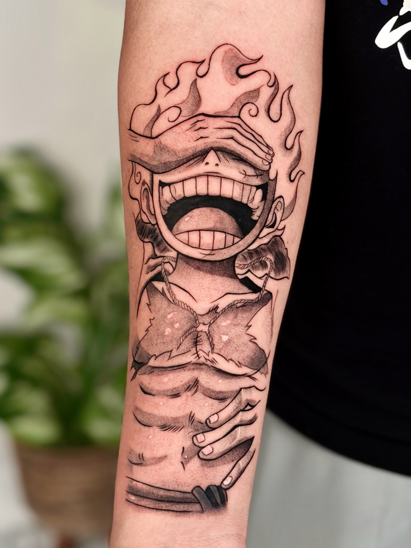 Flaming mouth black and grey tattoo on the forearm by Quinn ᶻ 𝗓 𐰁 .ᐟ, Charlotte, North Carolina