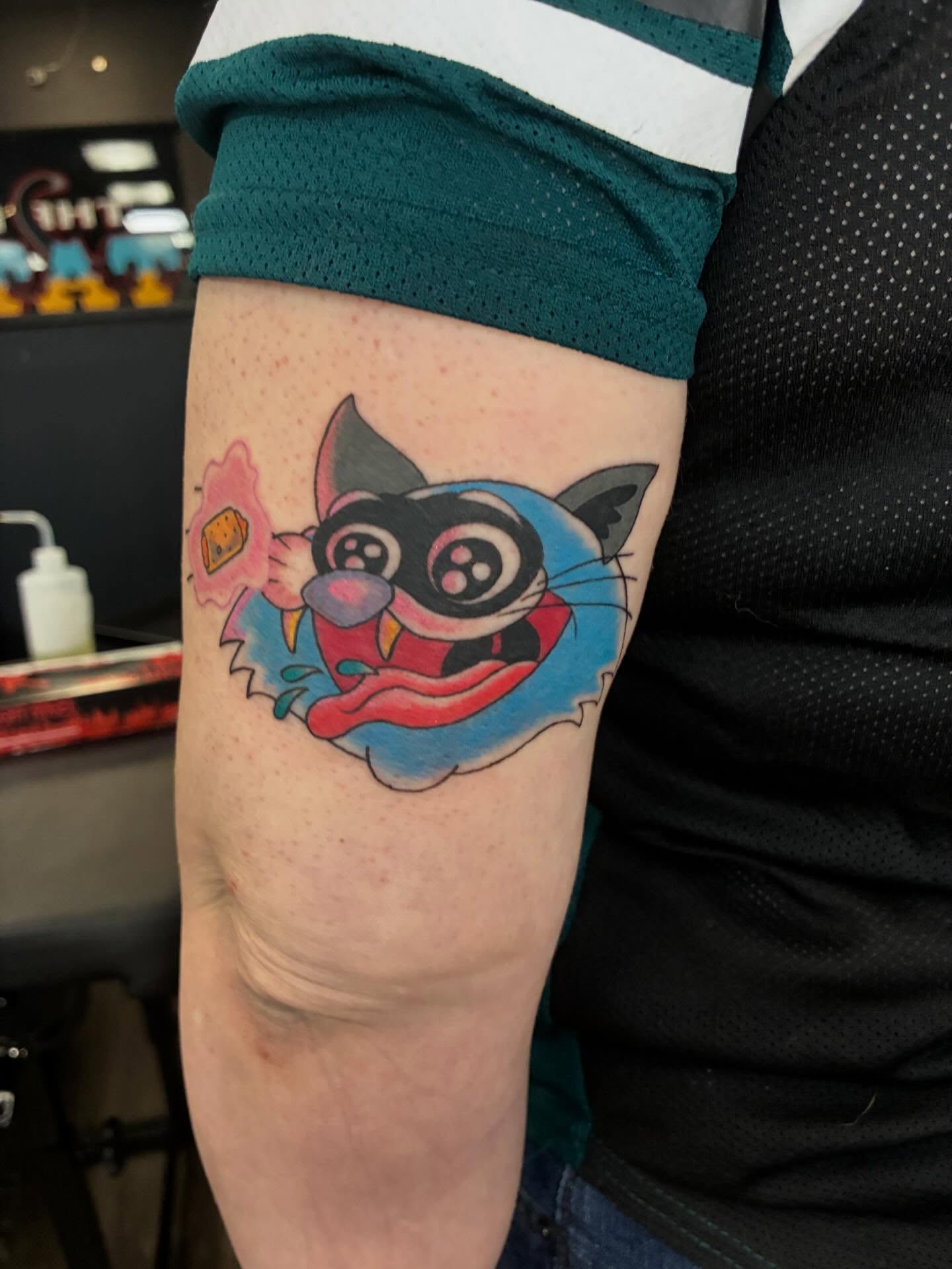 Cat anime tattoo on the forearm by Hit & Run Tattoo, Dayton, Ohio