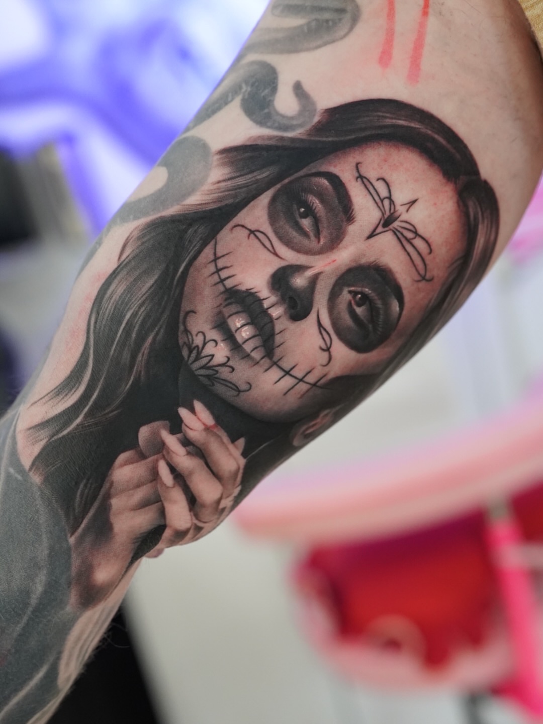 Sugar skull realism tattoo on the forearm by Luis Rodriguez