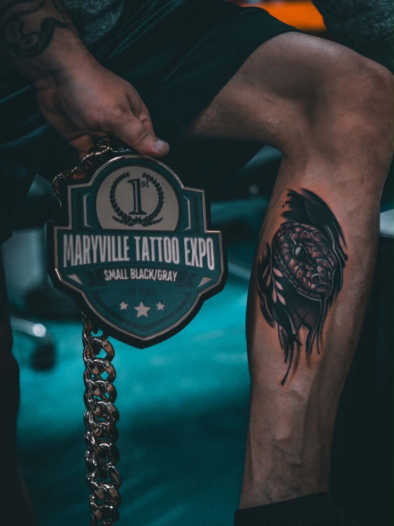Tattoo by @tattoos_by_tg — realism, black_and_grey