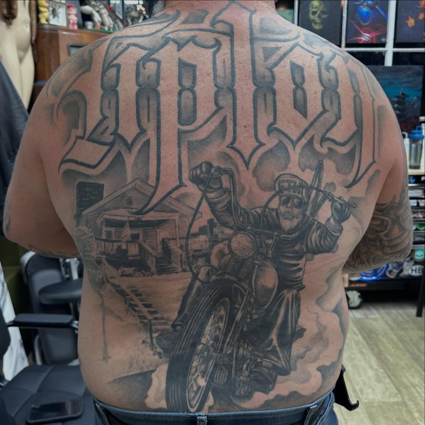 Motorcycle rider realism tattoo on the back by Dustin Clark, Dayton, Ohio