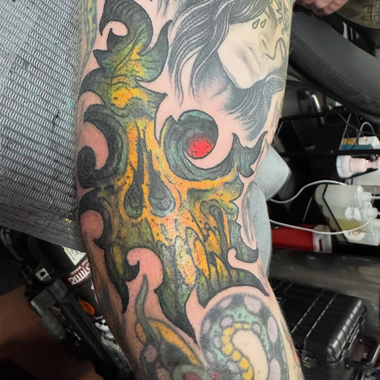Abstract skull new school tattoo on the forearm by Tim Lehi, Oakland, California