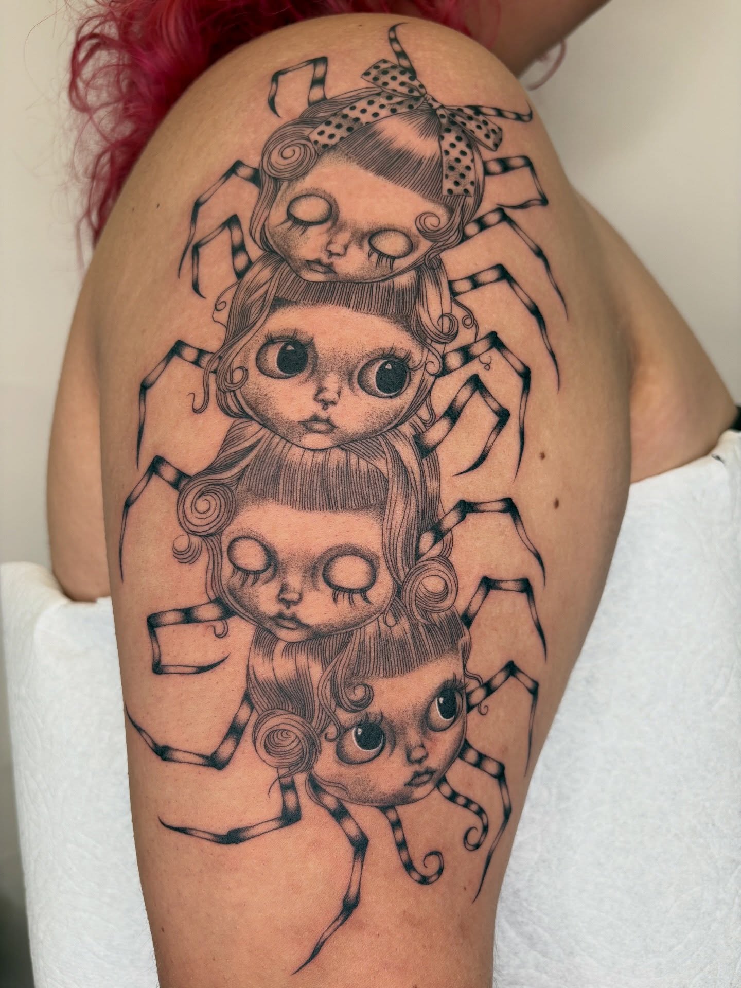 Spider dolls realism tattoo on the thigh by Nori