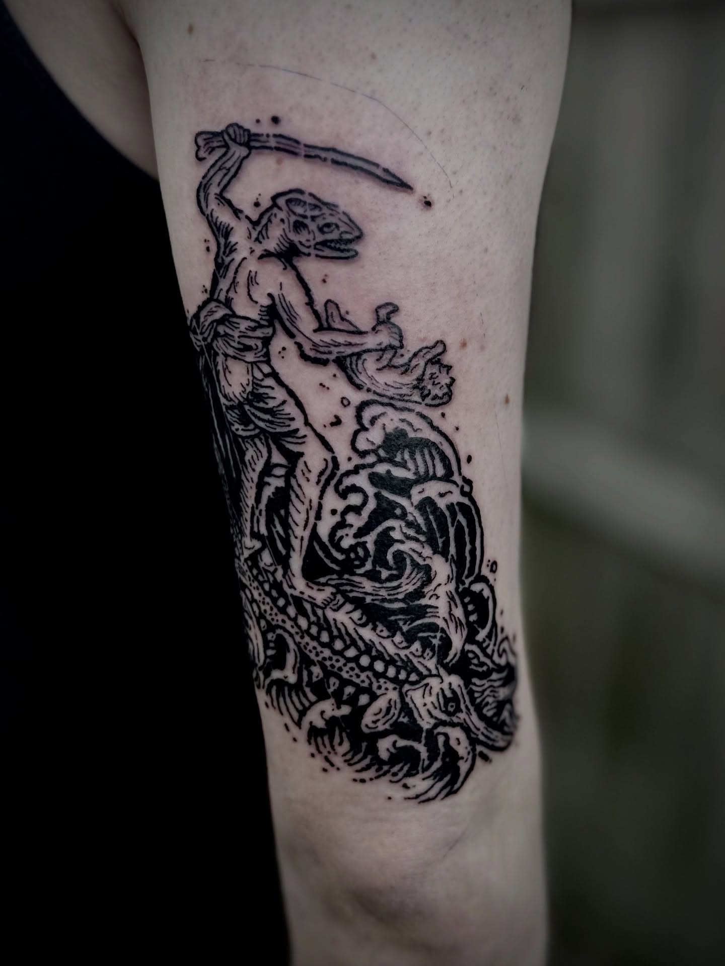 Mermaid and scythe black and grey tattoo on the forearm by Noah Durany