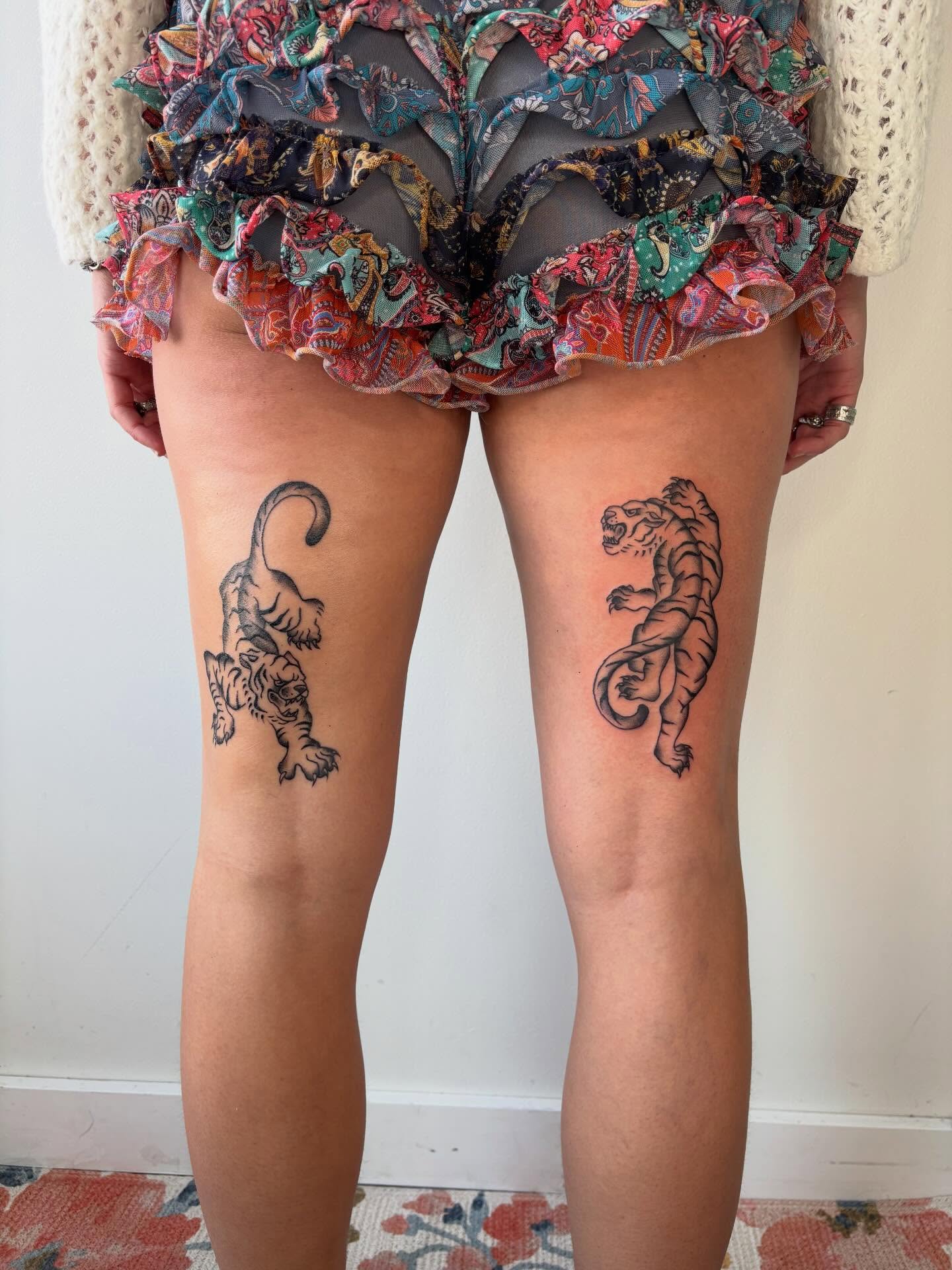 Tiger black and grey tattoo on the thigh by Topher Belmont