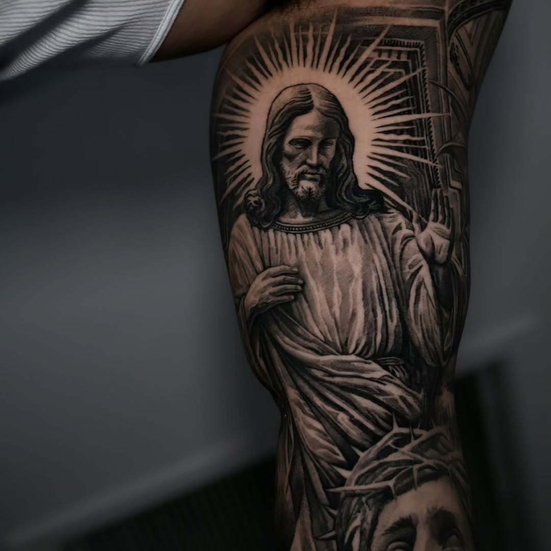 Jesus Christ portrait realism tattoo on the forearm by Viktor Nachev